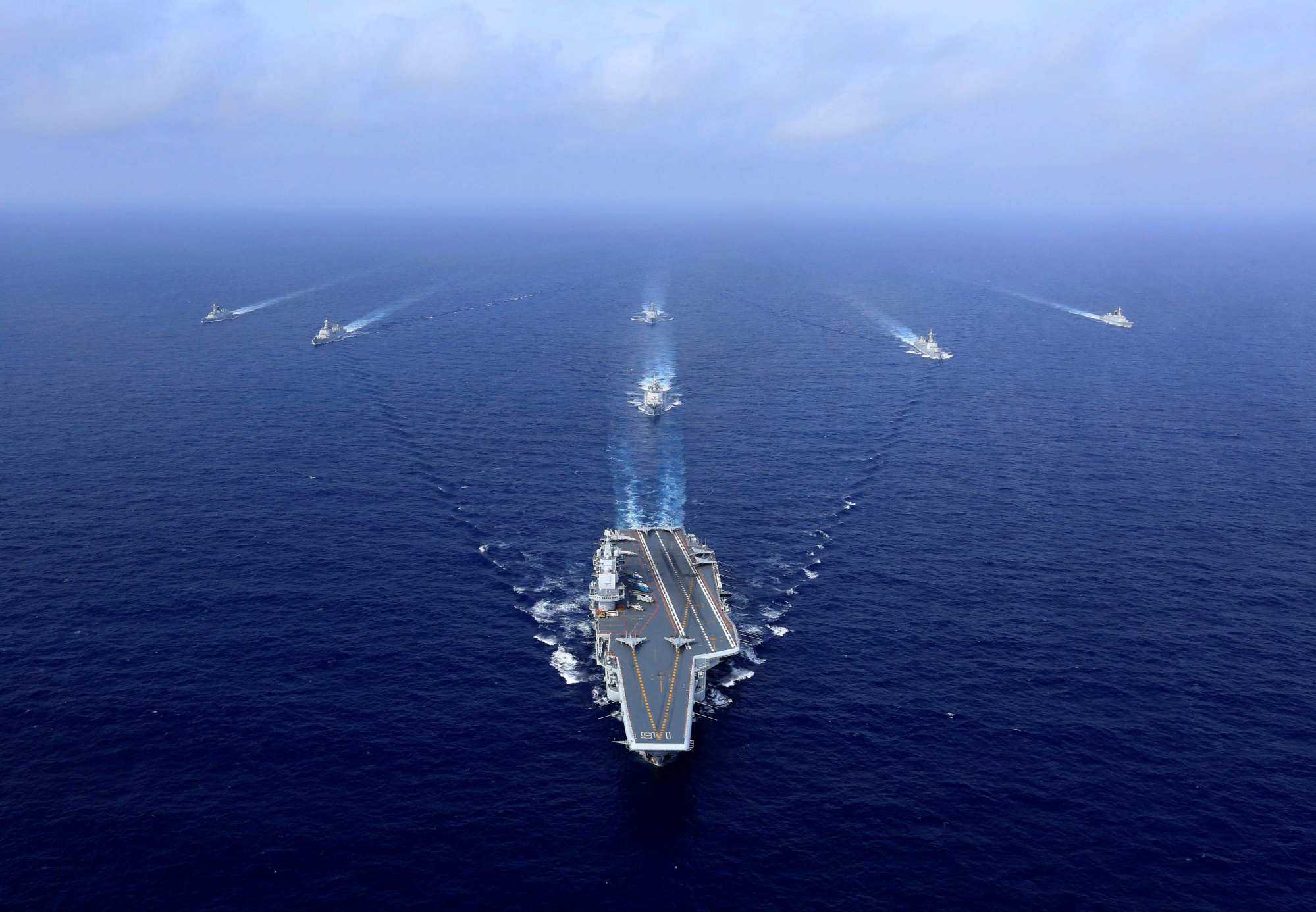 Chinese aircraft carrier, the Liaoning, shown during a 2018 drill, sailed through the Miyako Strait on Saturday. Photo: AFP