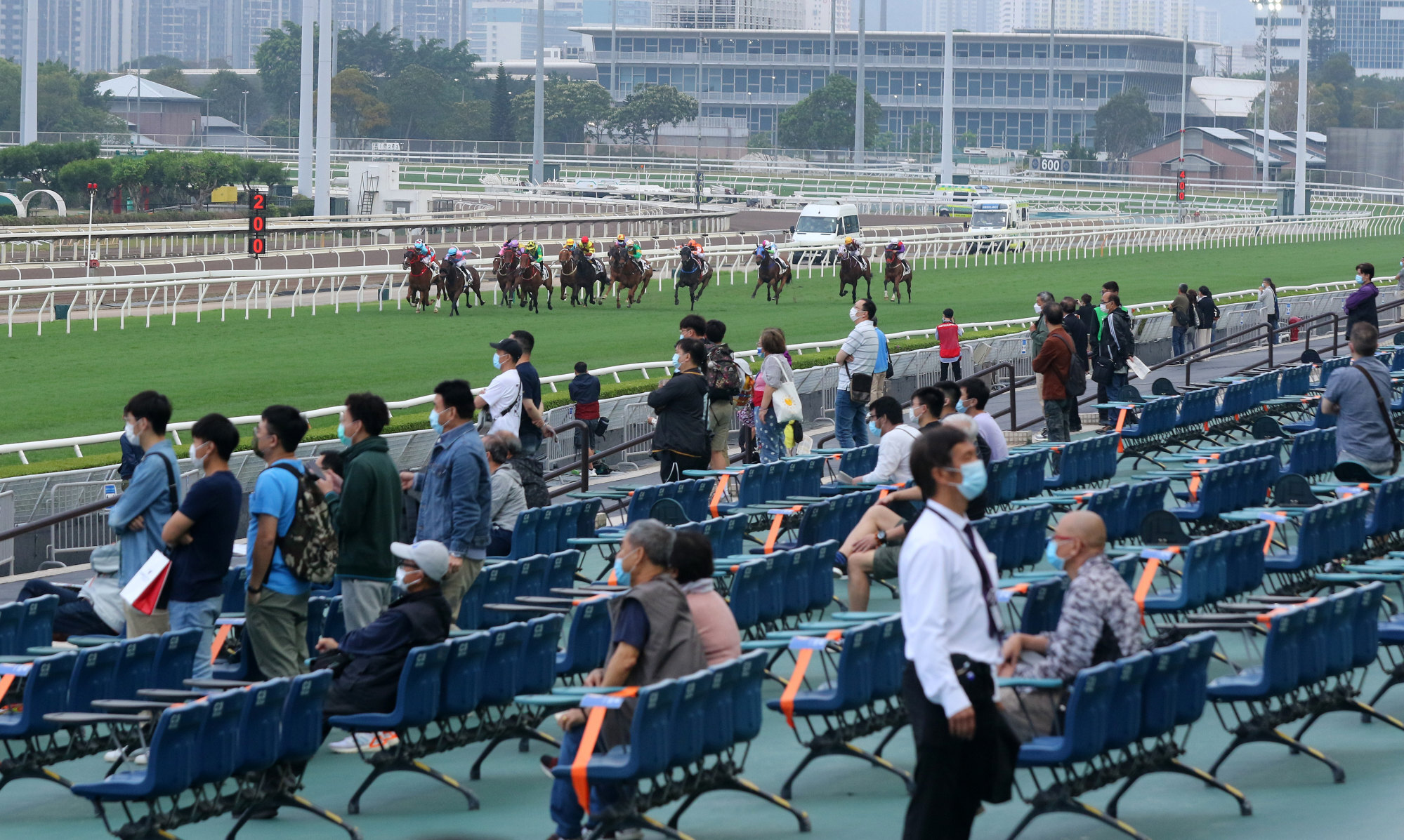 General public watch on as horses race at Sha Tin.