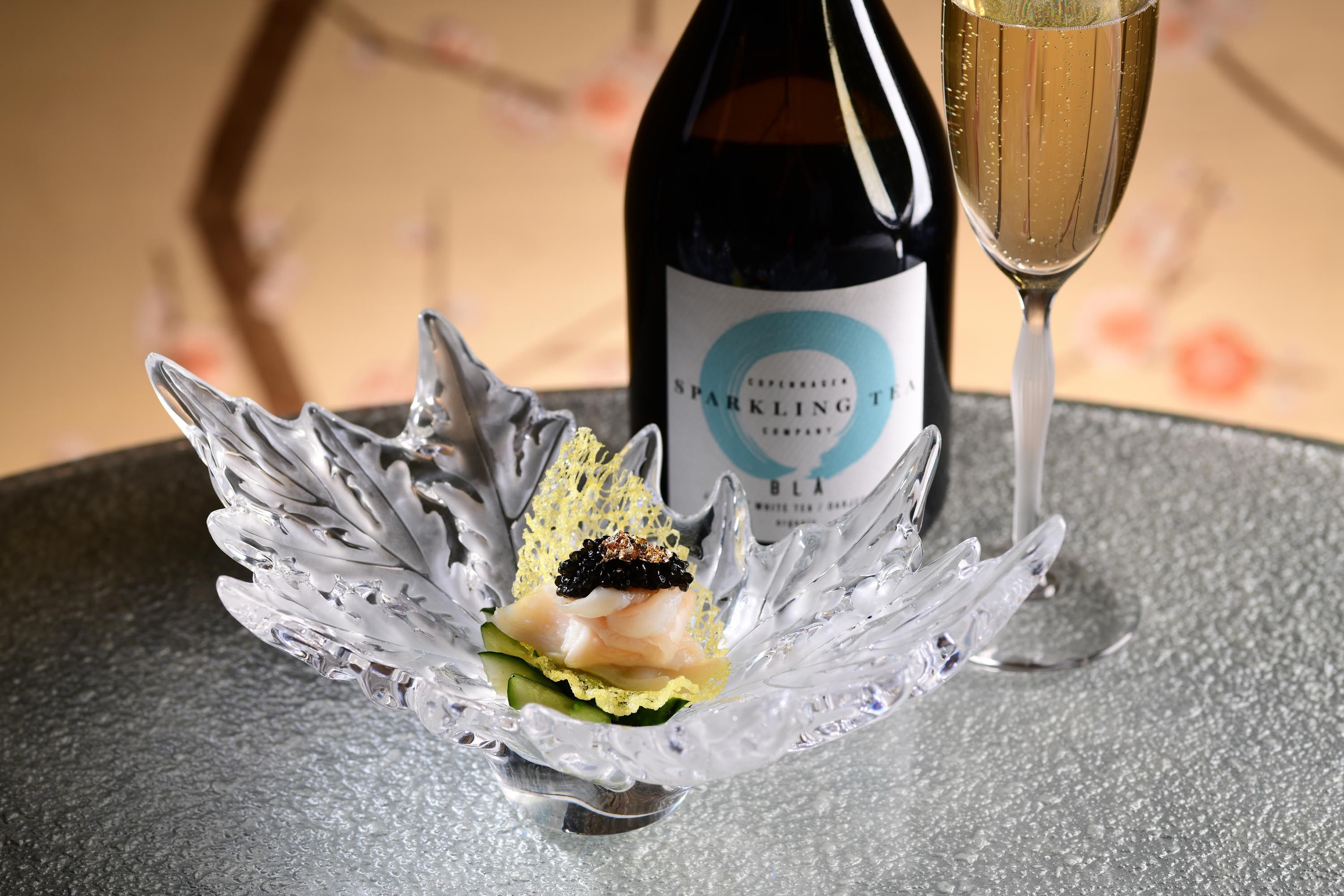 Drunken razor clam, Shaoxing rice wine, simmered, topped with caviar – one of the seasonal lifestyle treats and experiences on offer this month. Photo: Ming Court