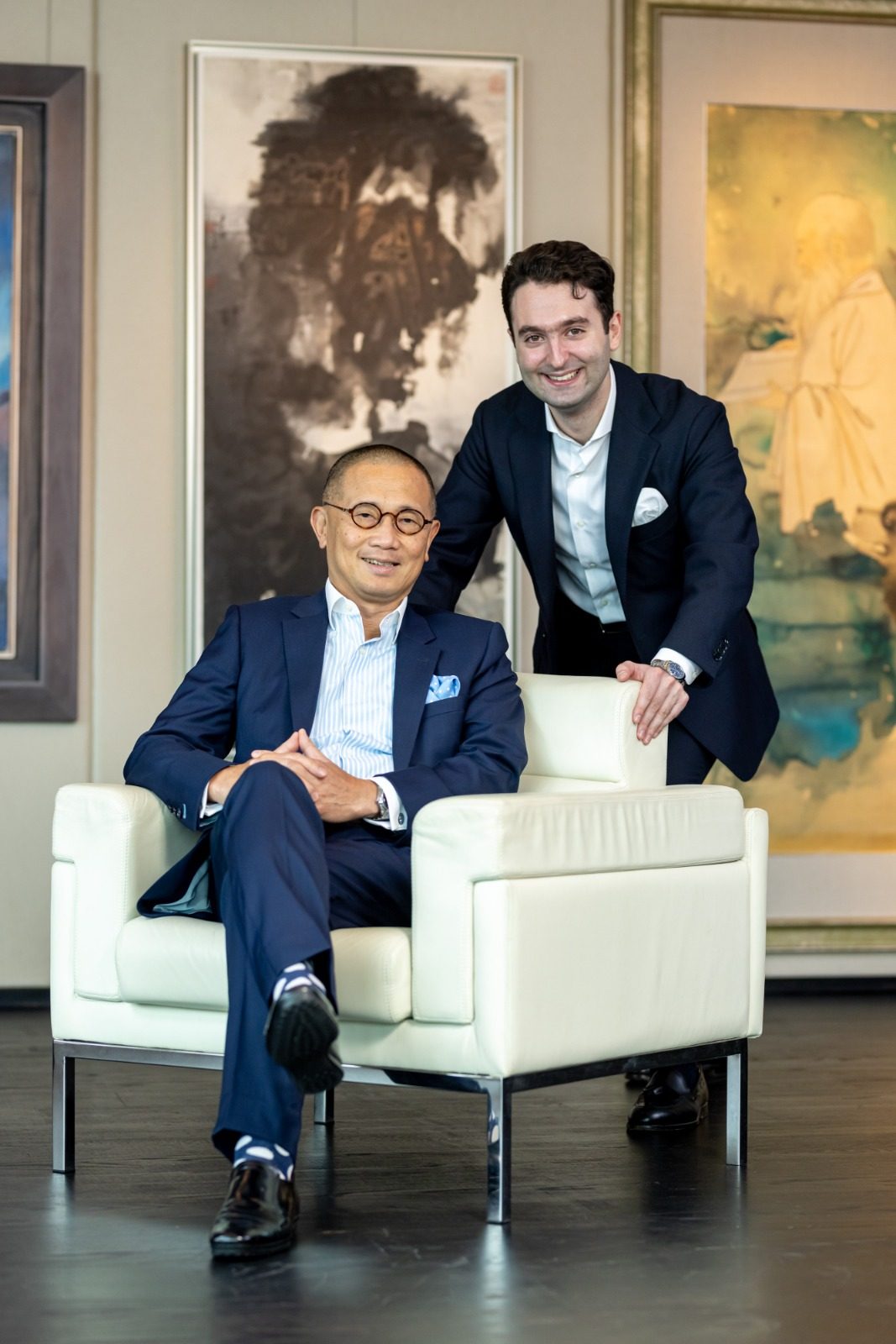 Kevin Ching (seated), Sotheby’s outgoing Asia CEO, and Nathan Drahi, the 26-year-old son of Sotheby’s owner Patrick Drahi, who will take on the role of the company’s managing director in Asia at the end of the year.