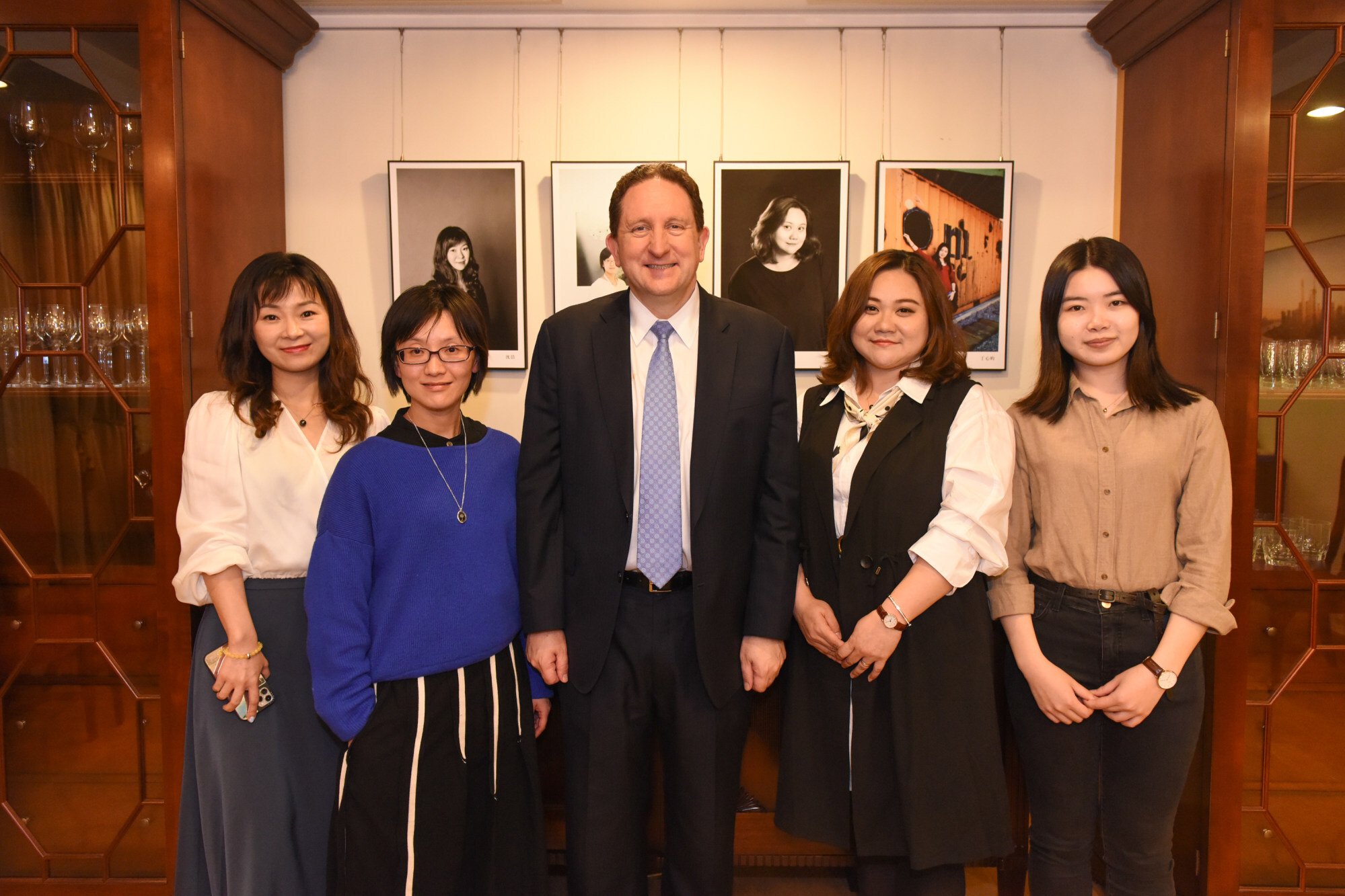 US Consul General James Heller with photographers (from left) Shen Jie, Zhou Yang, Zhang Xi and Ding Xinyun. Photo: Space33