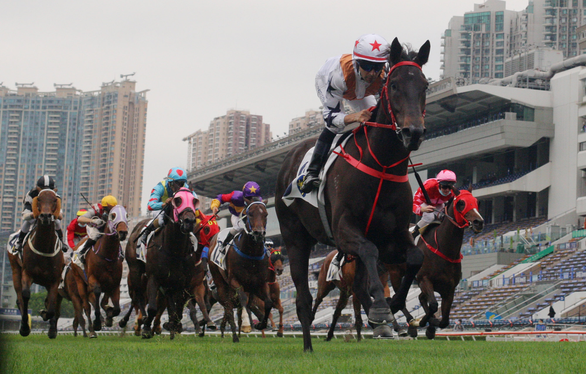 Joao Moreira sits quietly as Courier Wonder coasts to victory at Sha Tin.