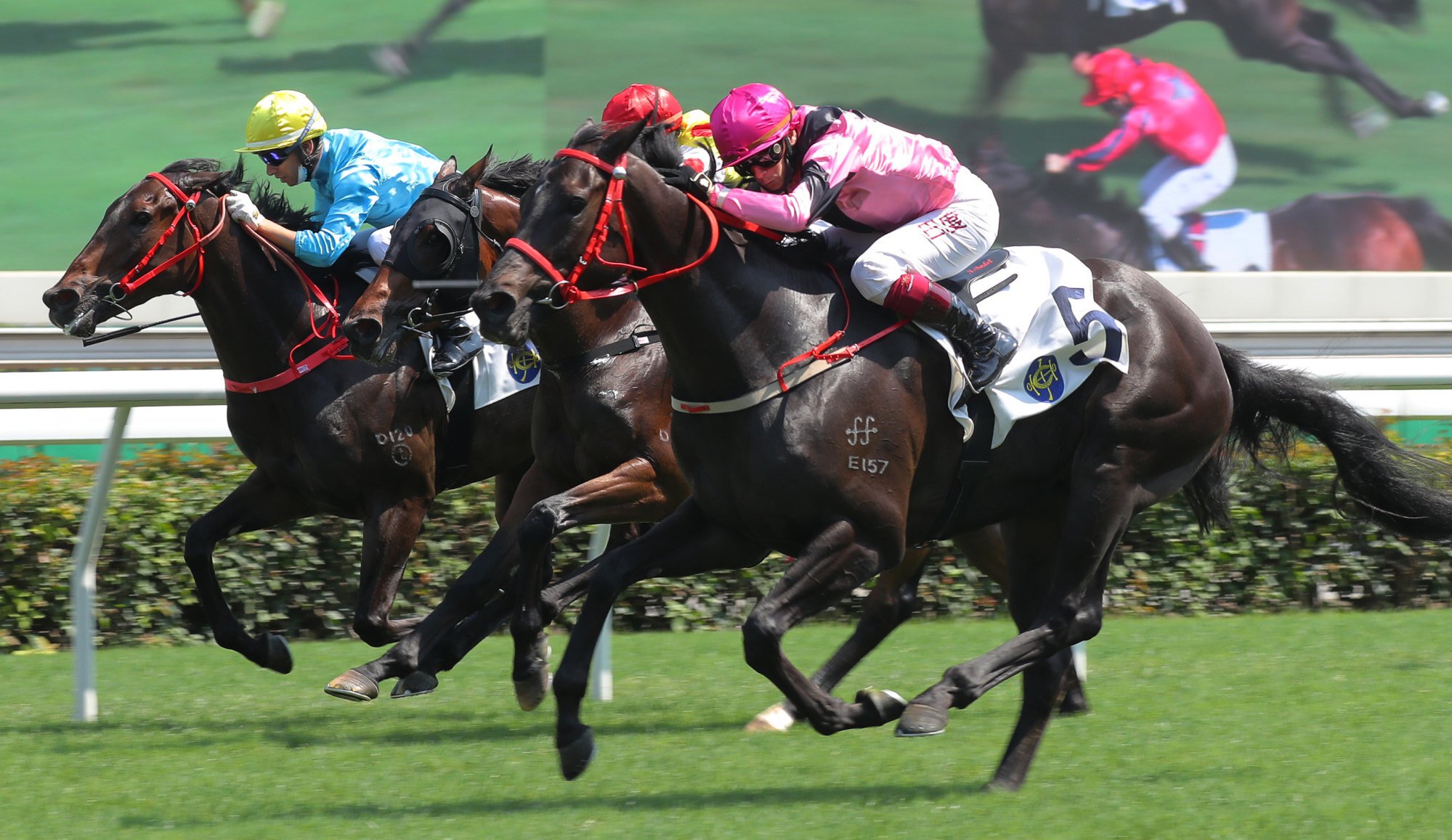 Alexis Badel (outside) boots home Gluck Racer to win at Sha Tin. 