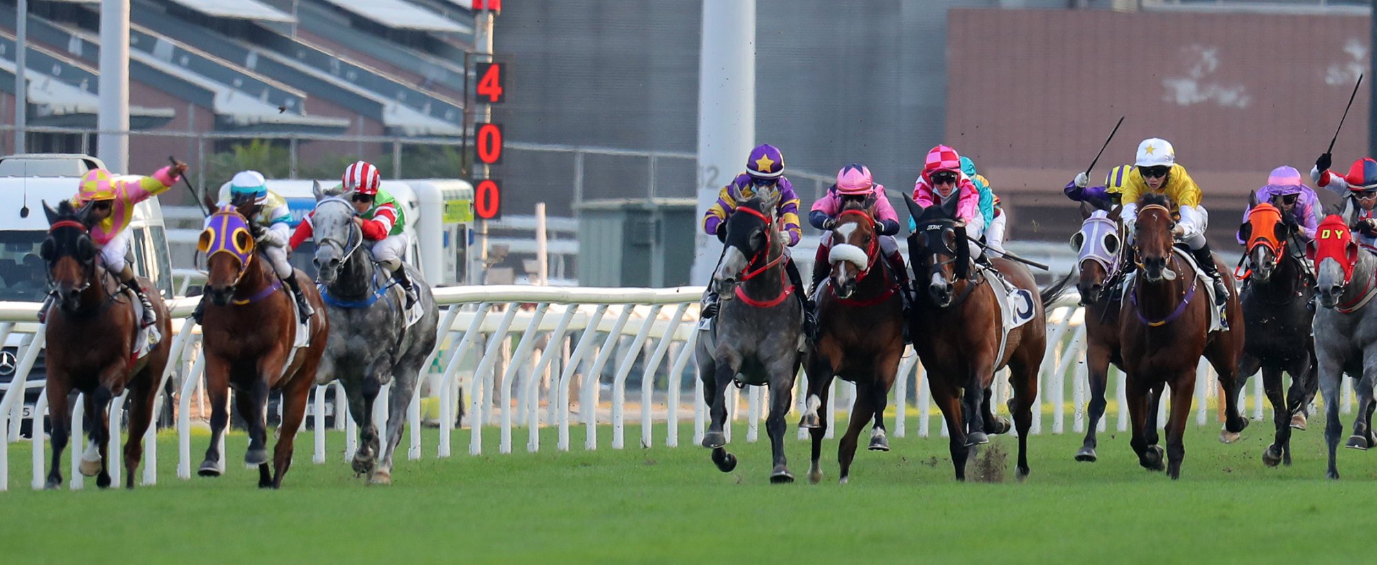 Hinchinlove (second from left) dashes clear while Silver Express (centre) causes interference in the straight. 