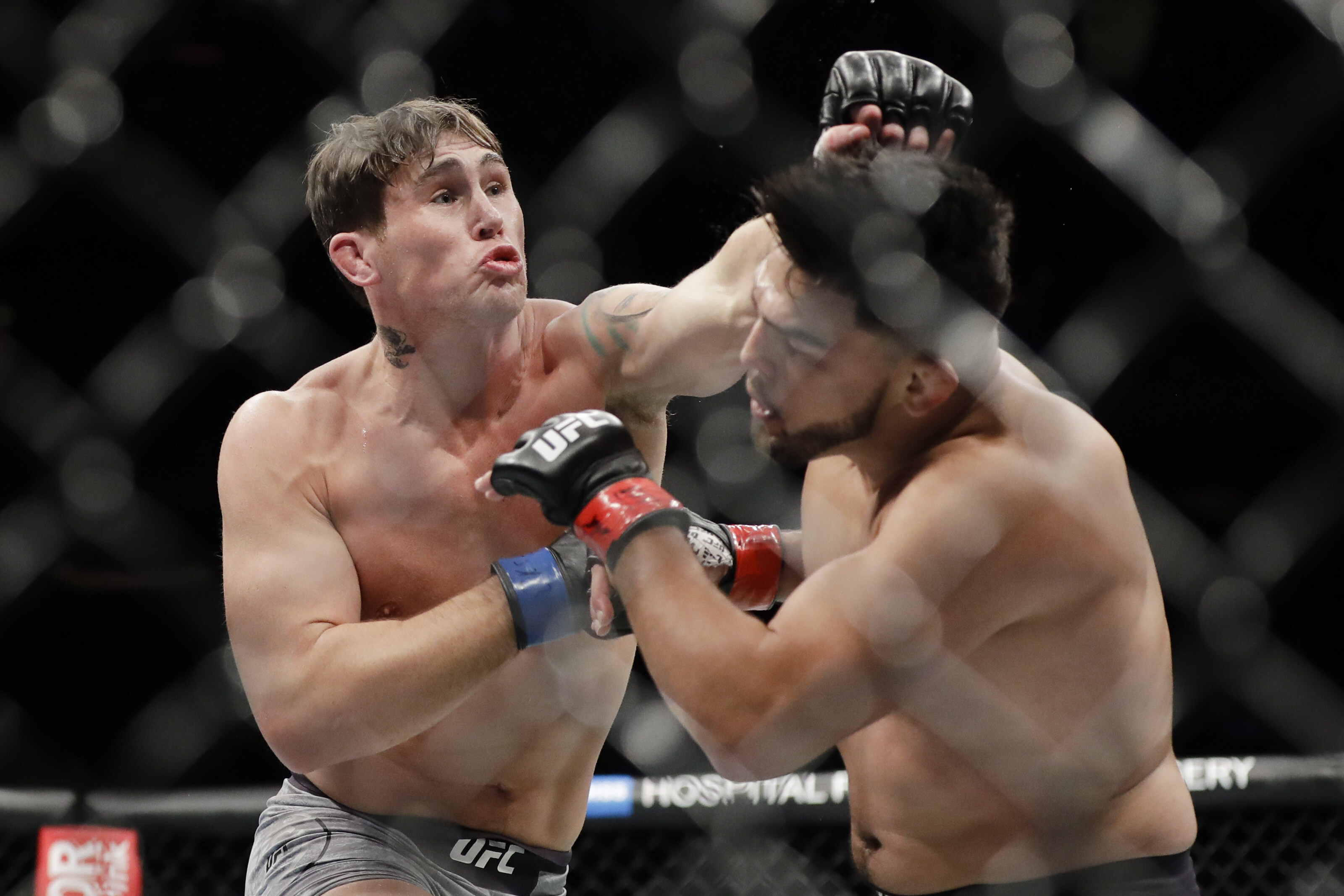 UFC middleweight fighter Darren Till punches Kelvin Gastelum in their bout at UFC 244 in New York in November 2019. Photo: AP  