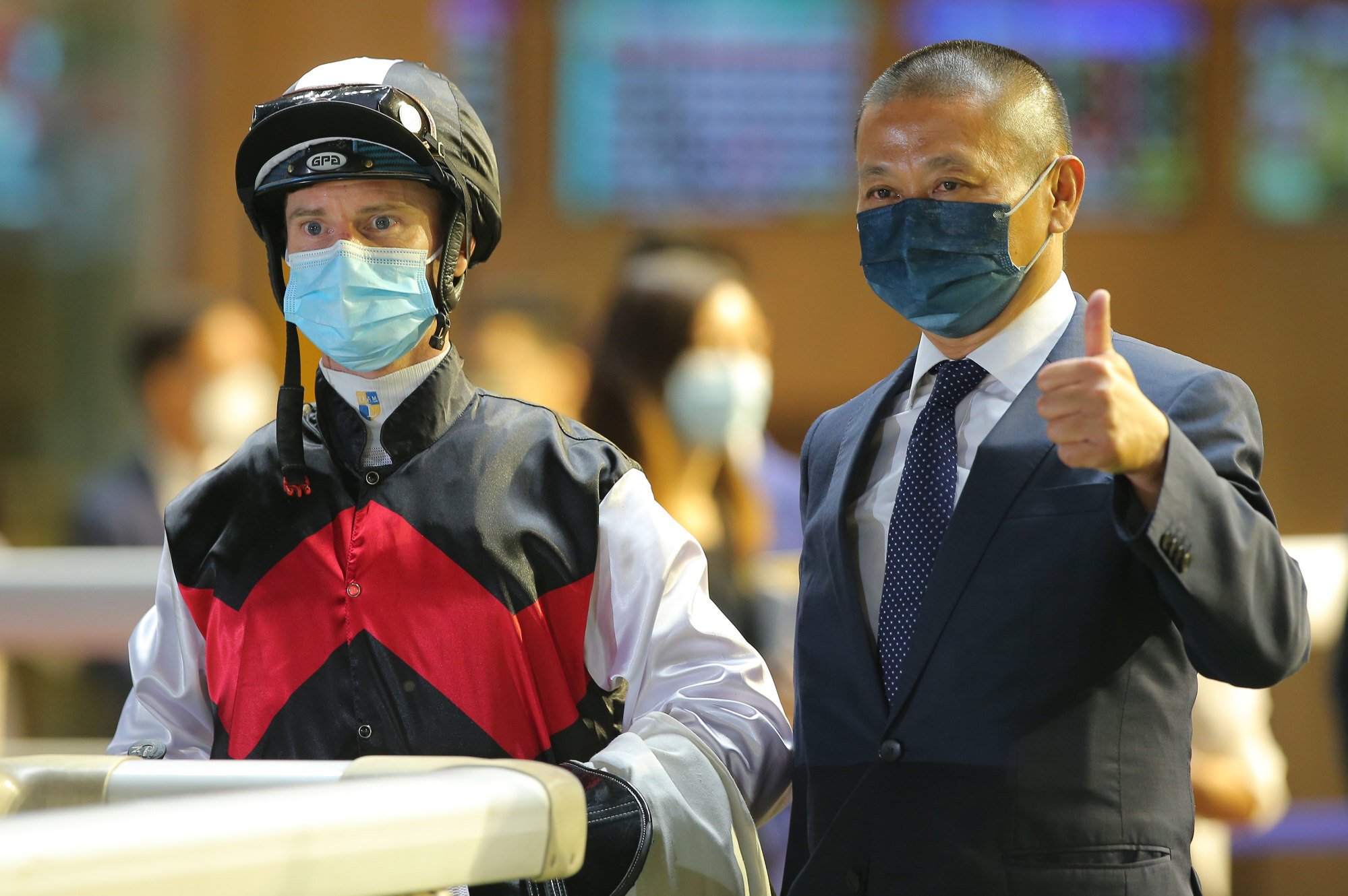 Zac Purton and Danny Shum after Young Legend’s victory at Happy Valley on Wednesday night. 