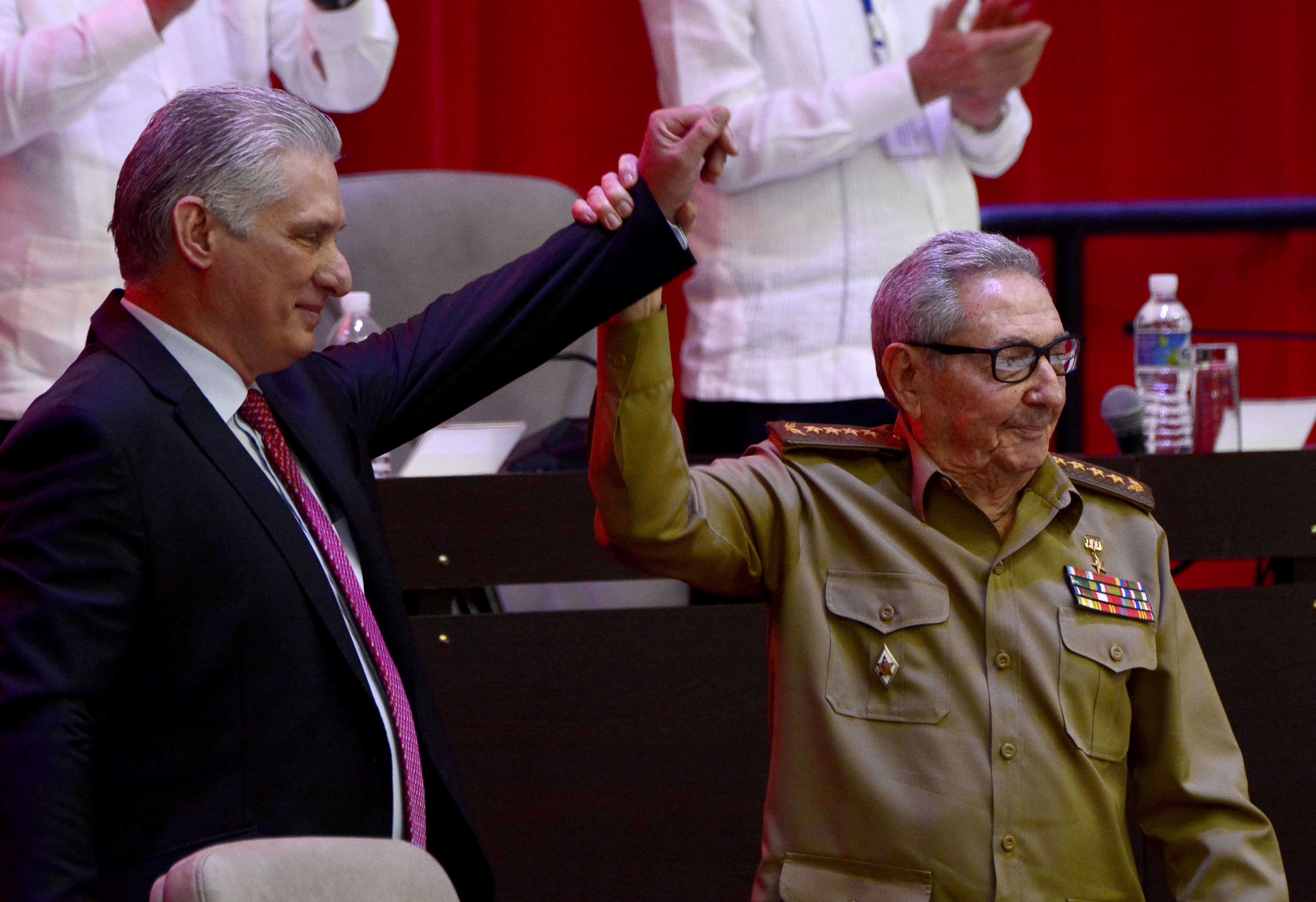 Cuba’s President and newly elected First Secretary of the Communist Party Miguel Diaz-Canel, left, and former Cuban President Raul Castro in Havana, Cuba, on Monday. Photo: ACN via Reuters 