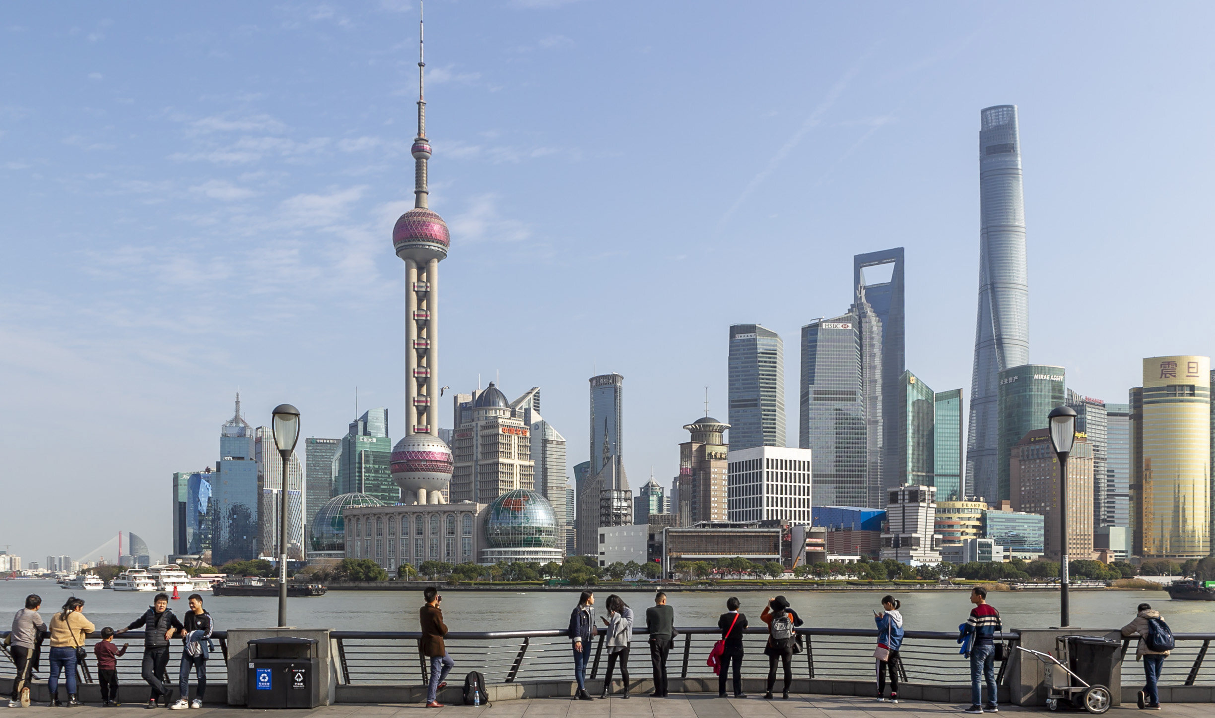 (200522) -- BEIJING, May 22, 2020 (Xinhua) -- Tourists admire the skyline view of Lujiazui area at the Bund in Shanghai, east China, Jan. 6, 2020. China’s economy posted negative growth in the first quarter of this year, but it was “a price worth paying” to contain COVID-19 as life is invaluable, according to a government work report submitted Friday to the national legislature for deliberation. (Xinhua/Wang Xiang)