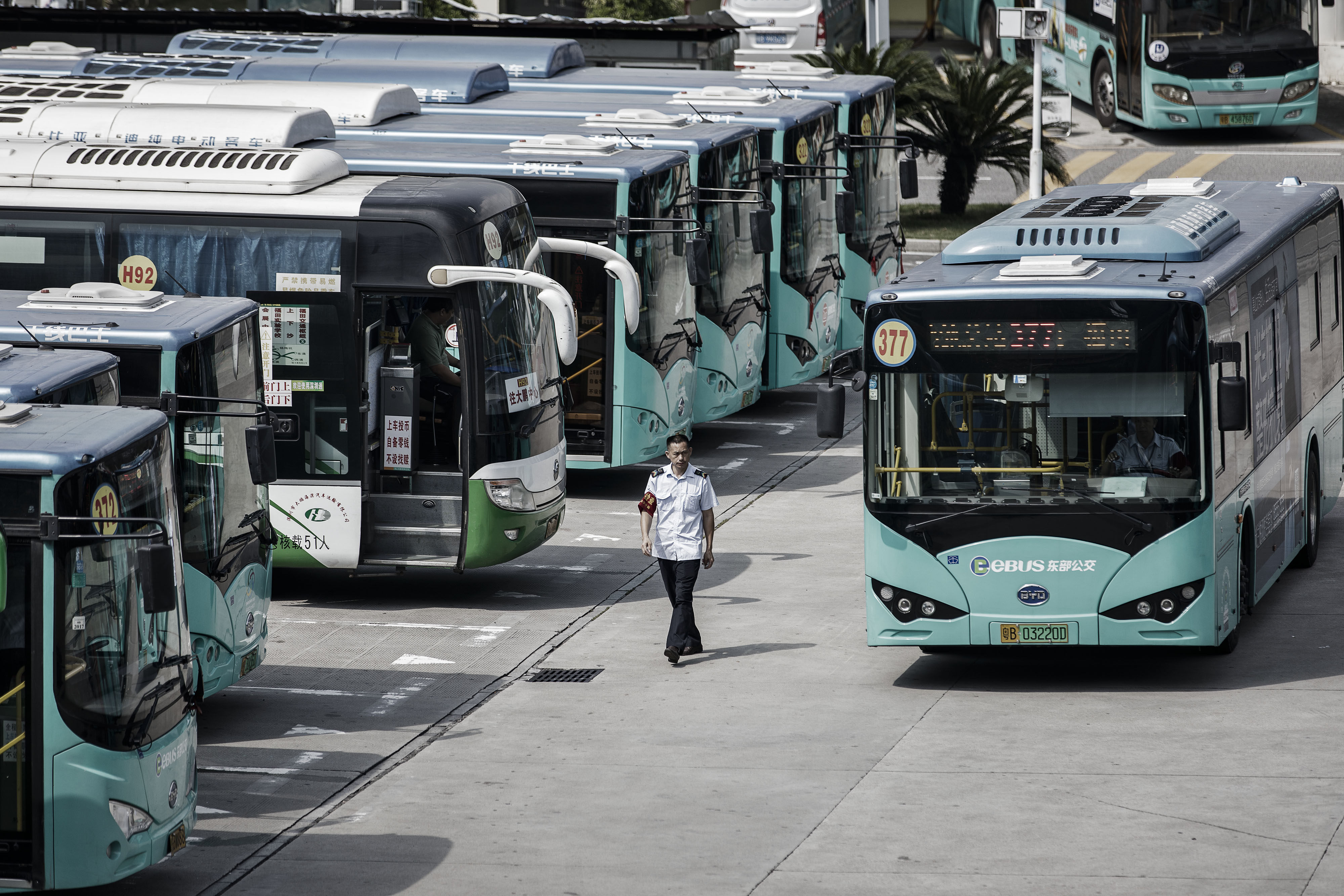 An electric bus arrives at a public transport hub in Shenzhen, China, in 2017. China is ahead of Hong Kong and the rest of the world in the shift to electric transport. Photo: Bloomberg 