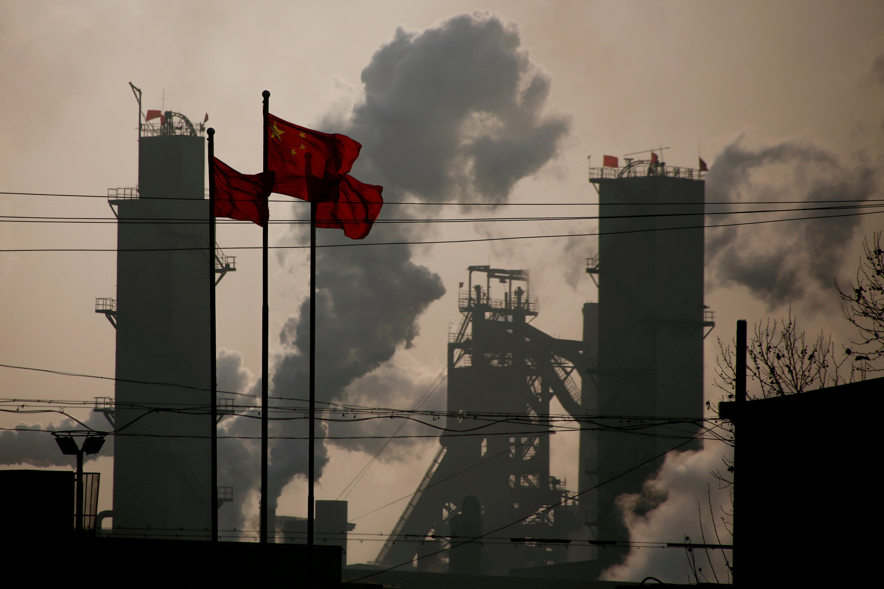 Emissions rise from a steel factory in Wu’an, Hebei province, on February 23, 2017. Photo: Reuters