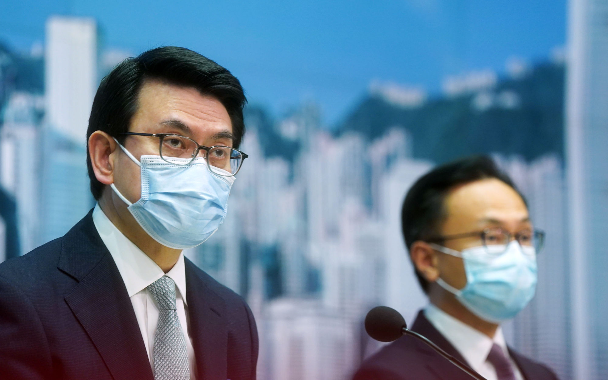 Hong Kong Secretary for Commerce and Economic Development Edward Yau Tang-wah and Secretary for the Civil Service Patrick Nip Tak-kuen attend a press conference to reveal plans for the air travel bubble with Singapore. Photo: SCMP / Sam Tsang