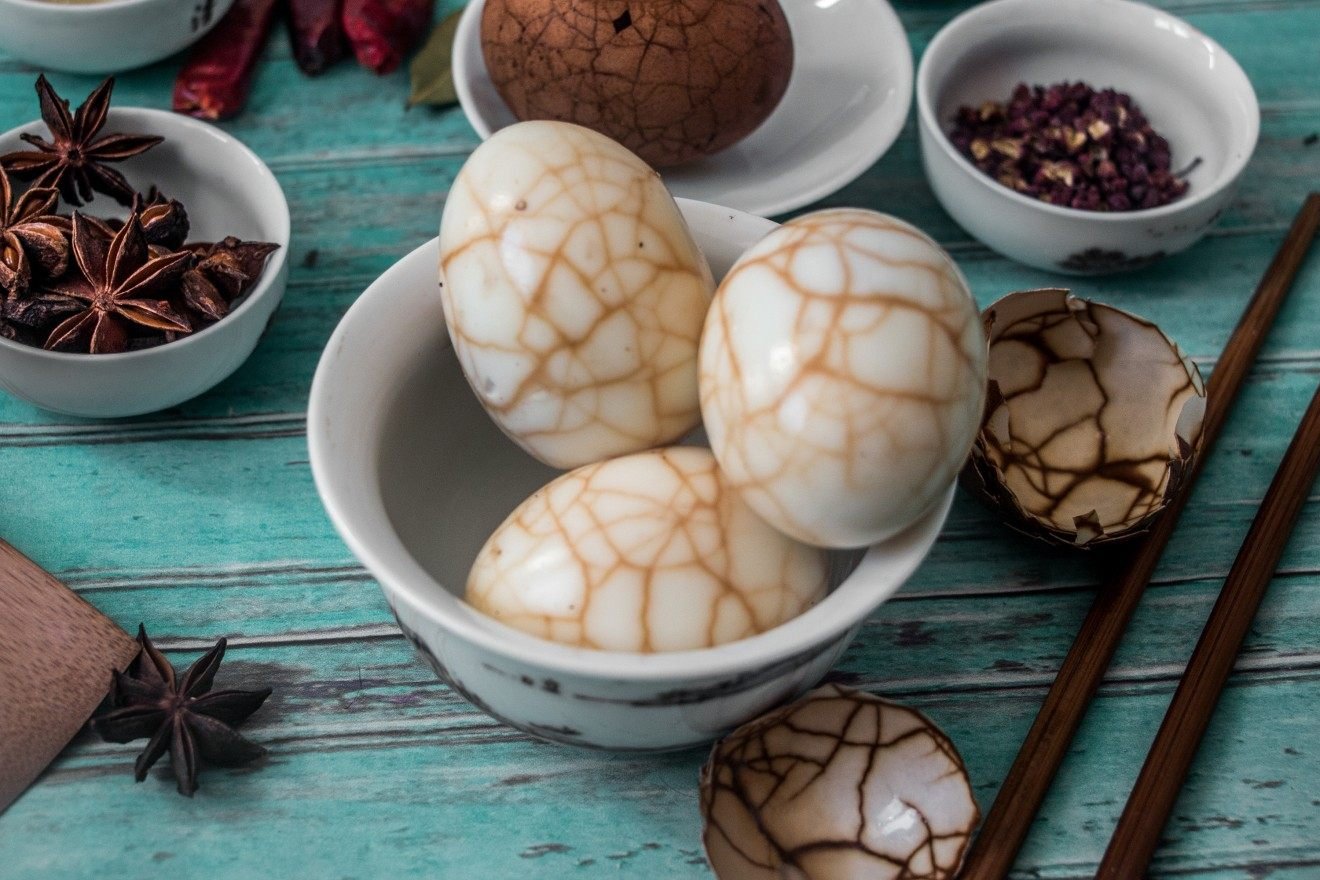 Tea eggs, along with some of the spices used to make the broth. Photo: Shutterstock