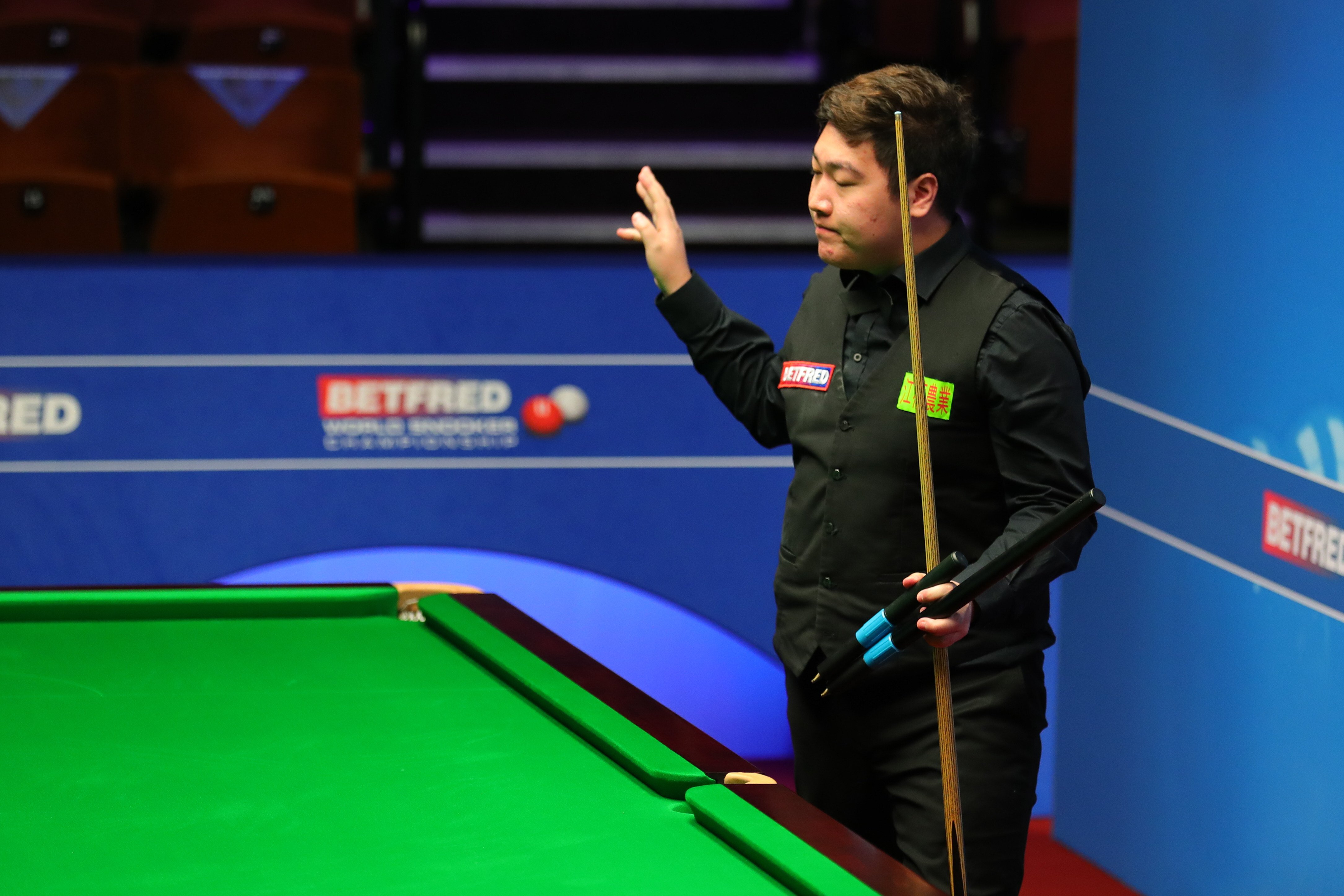 China’s Yan Bingtao reacts after losing to England’s Shaun Murphy at the World Snooker Championship in Sheffield. Photo: Xinhua