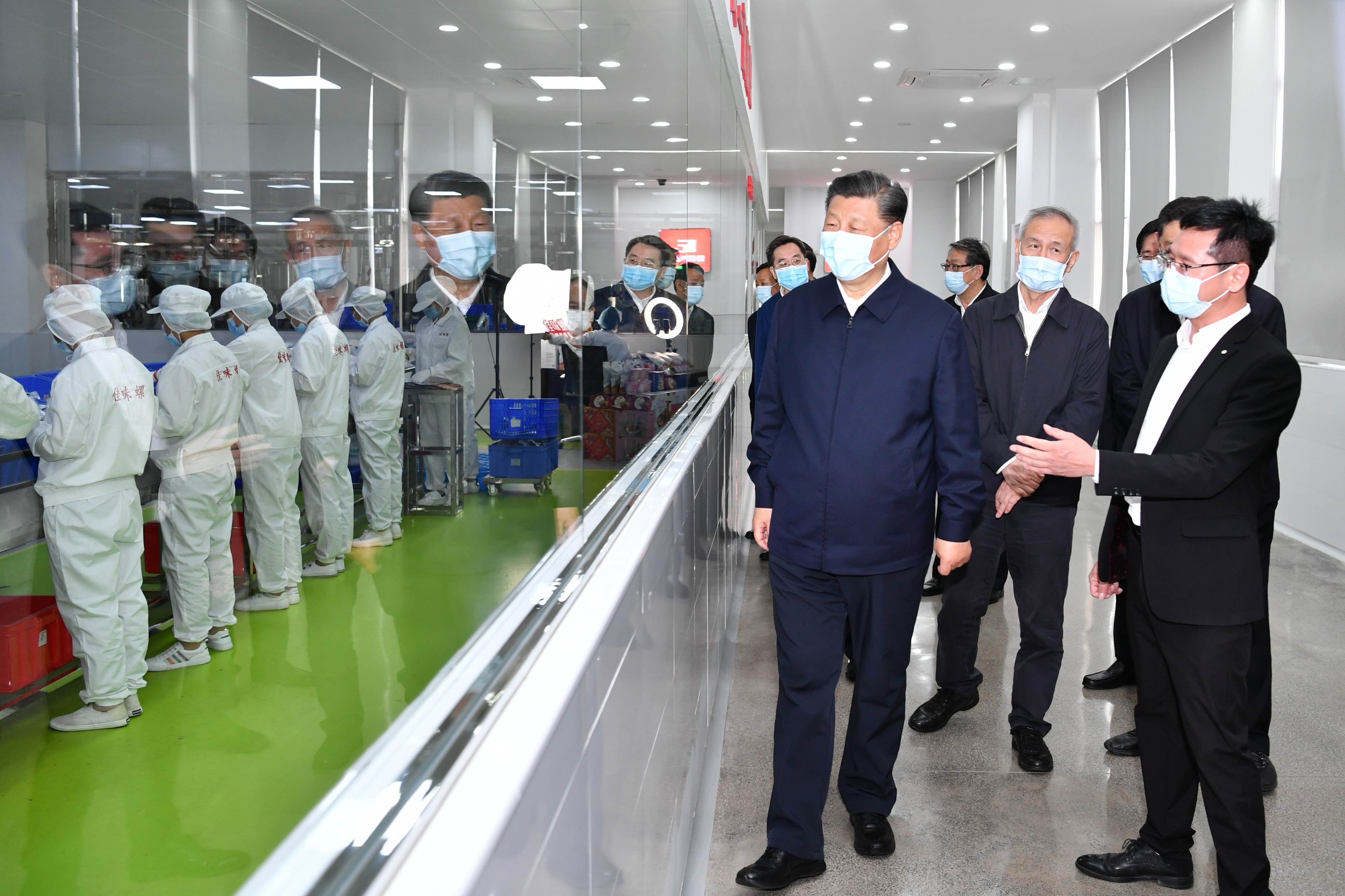 President Xi Jinping visits a food-processing facility for rice noodles in Liuzhou, Guangxi, this week. Photo: Xinhua