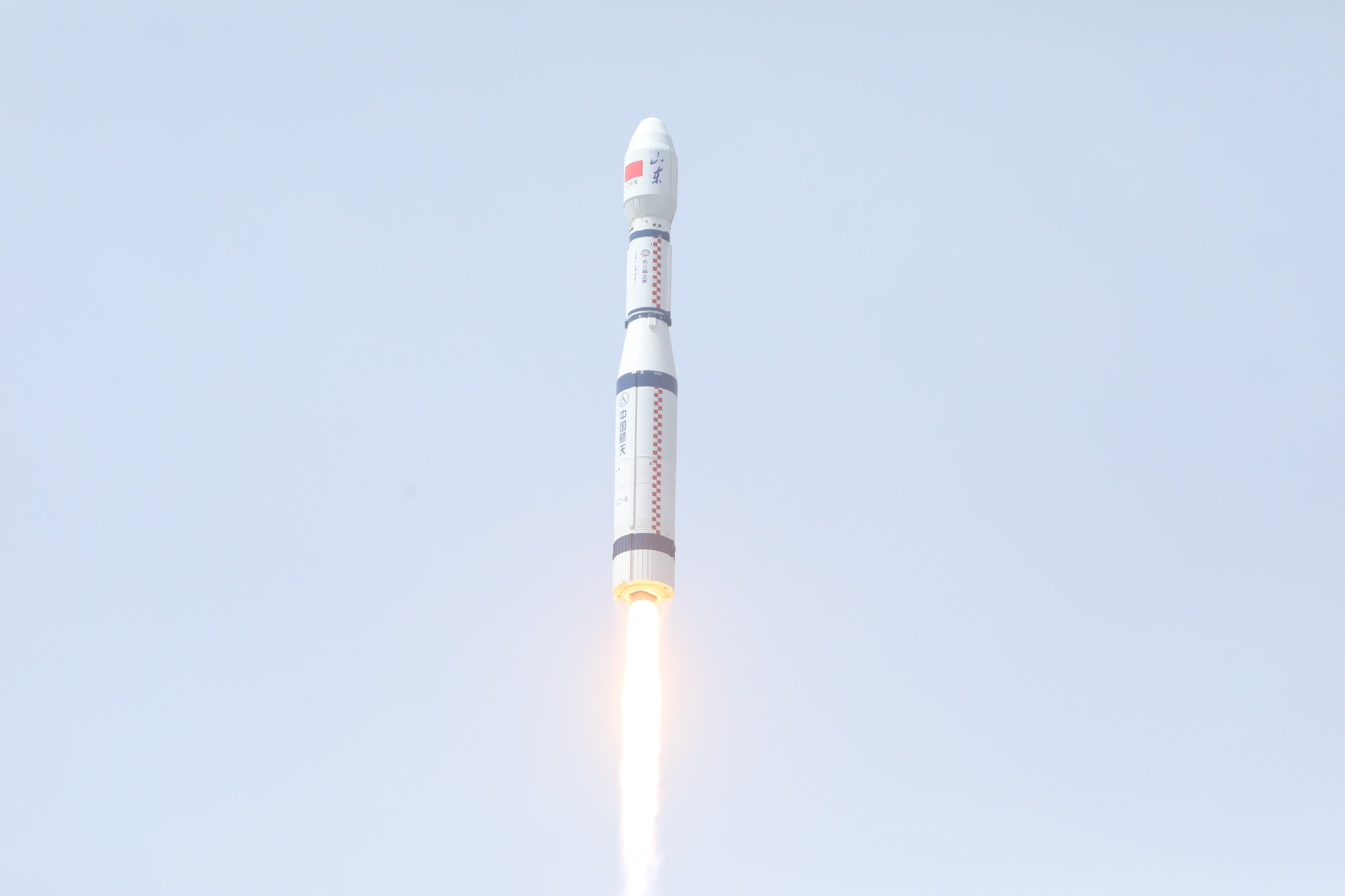 A Long March 6 rocket blasts off from the Taiyuan Satellite Launch Centre in Shanxi province, on Tuesday, sending nine commercial satellites into space. Photo: Xinhua