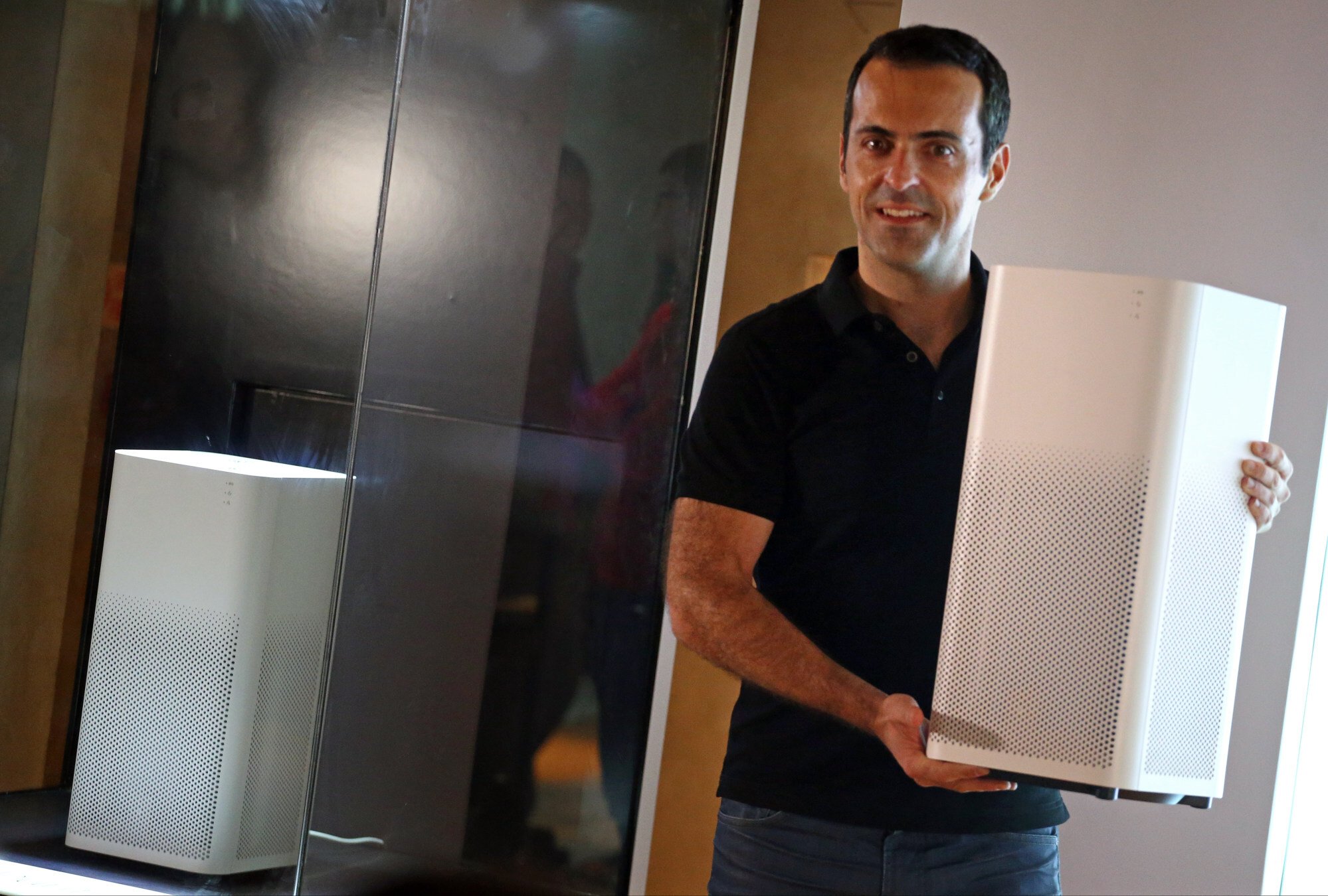 Hugo Barra, former vice-president of Xiaomi, introduces the Mi Air Purifier 2 during Xiaomi’s product launch on July 5, 2016, in Mong Kok. Photo: Felix Wong