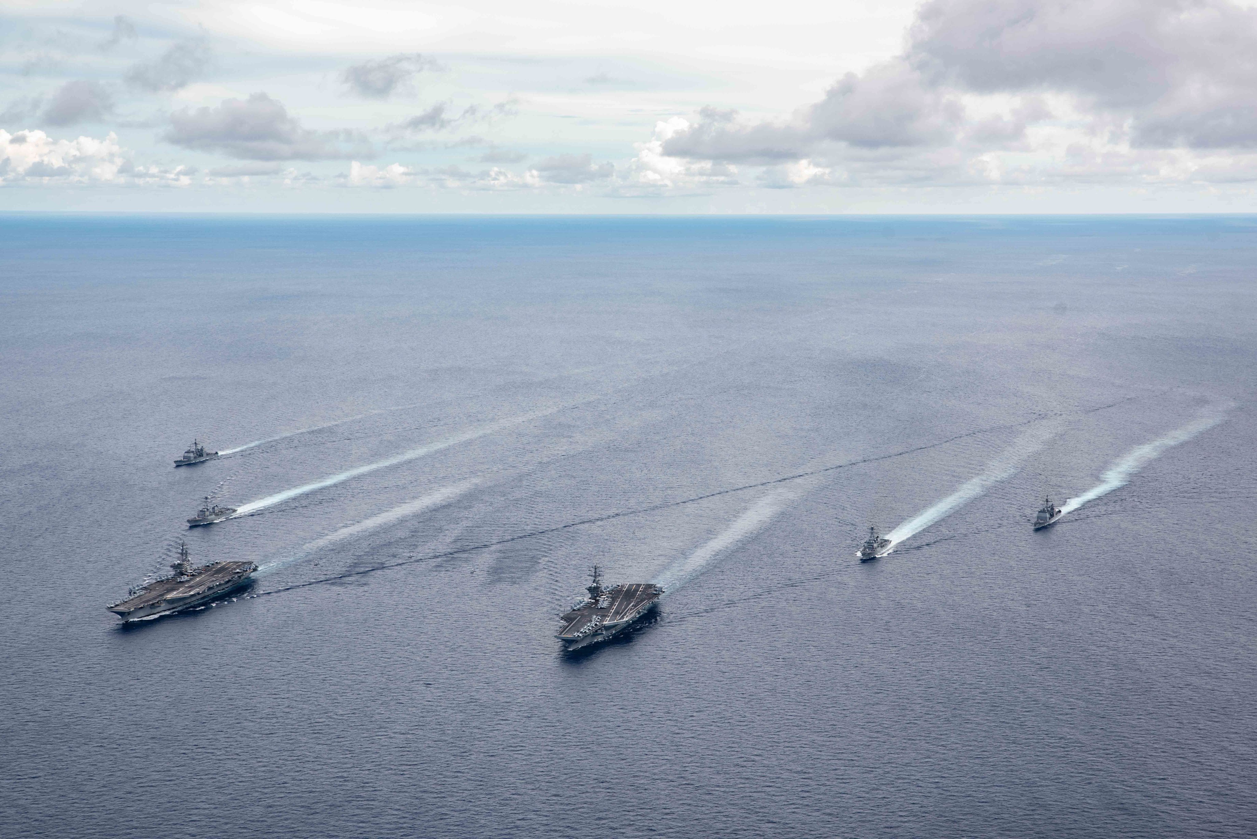 US Navy vessels are seen during a drill in the South China Sea as it strengthens its military presence in the Indo-Pacific. Photo: EPA-EFE