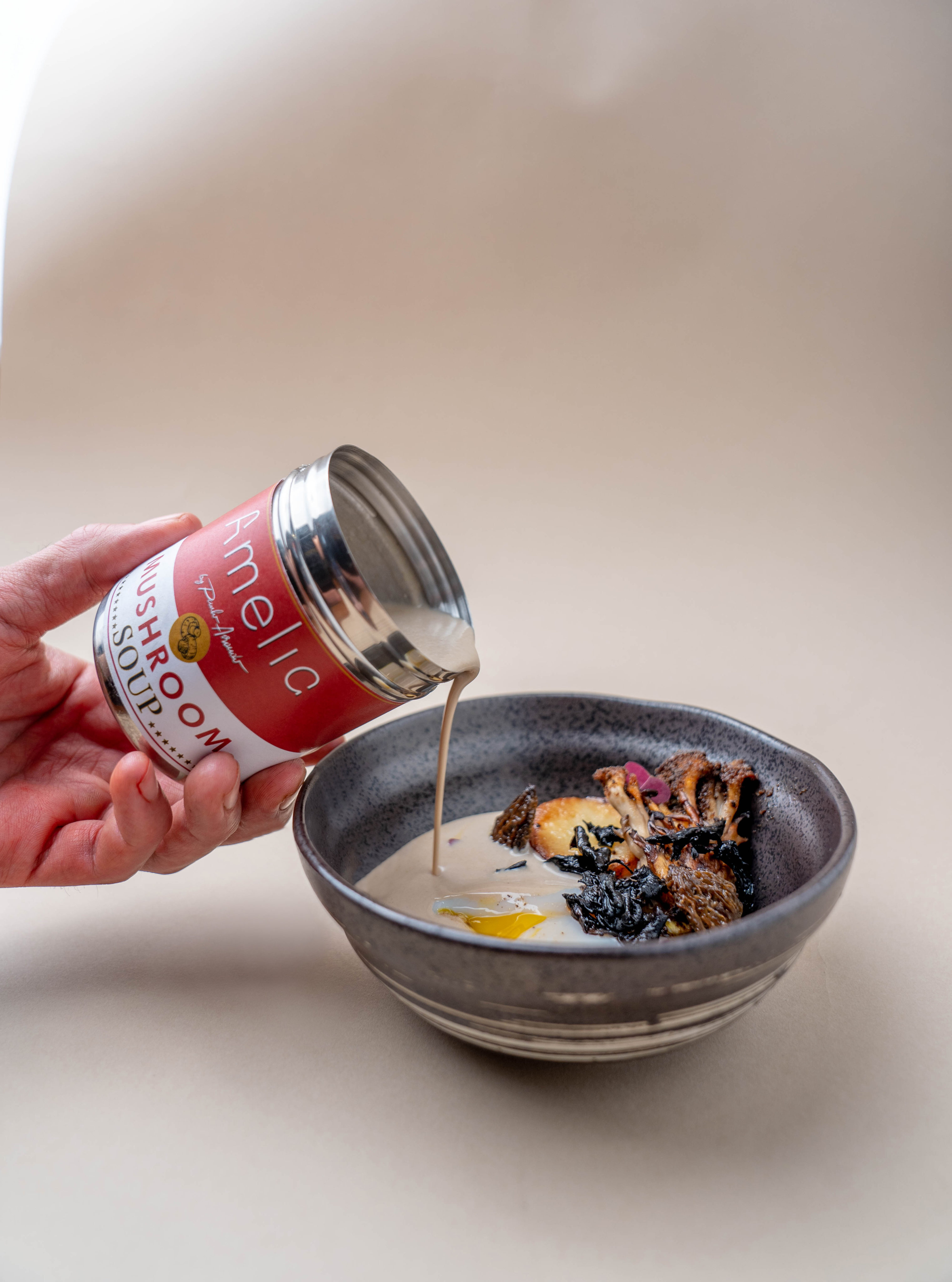 Inspired by Andy Warhol’s famous artwork Campbell’s Soup Cans, Amelia Hong Kong is offering a dish called Campbell Soup. The soup is poured table-side from a Campbell’s-style can. Photo: Amelia