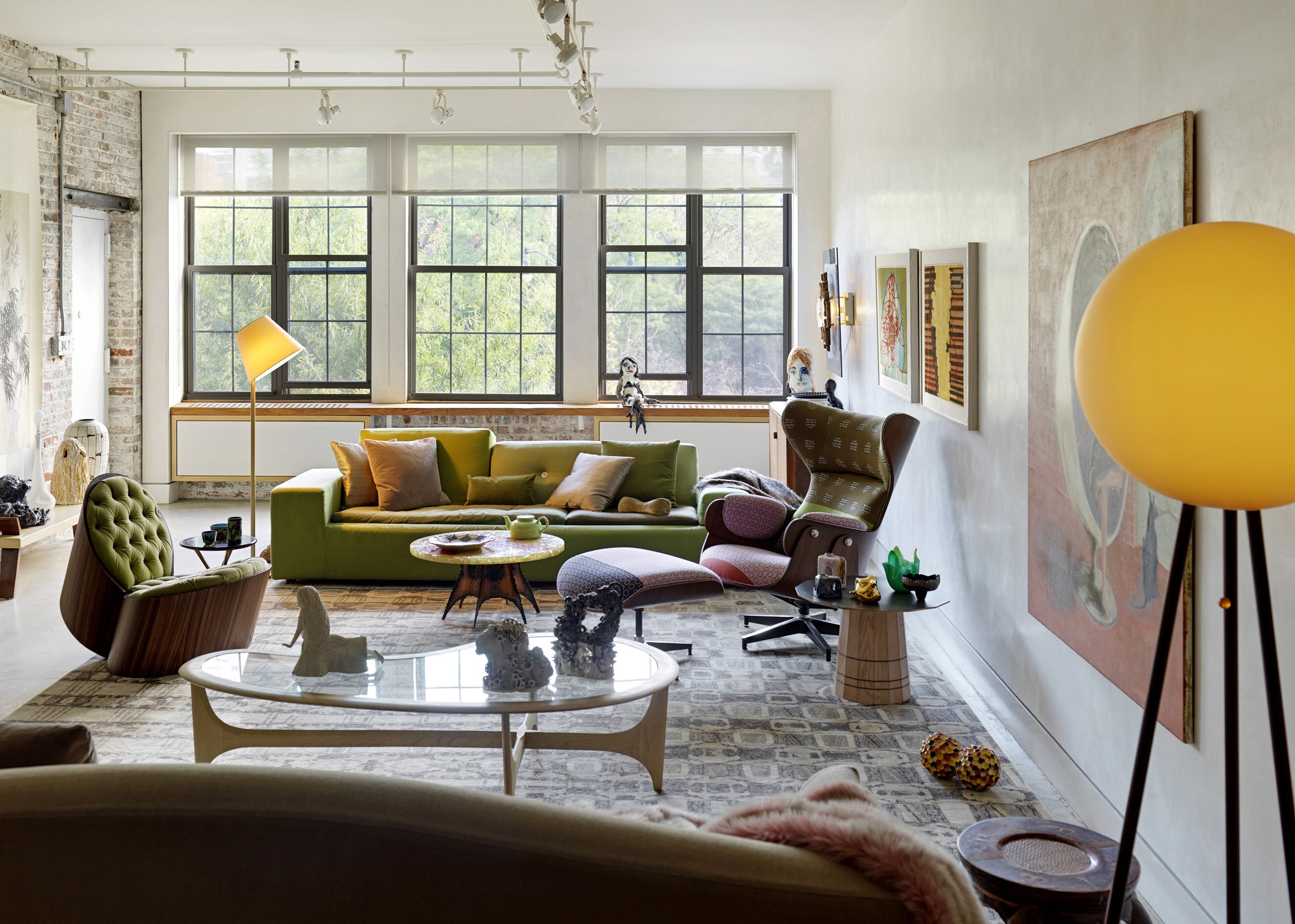 In the spacious New York loft of Janis Provisor and Brad Davis, furniture is clustered to create intimate areas. Photo: Jonathan Leijonhufvud