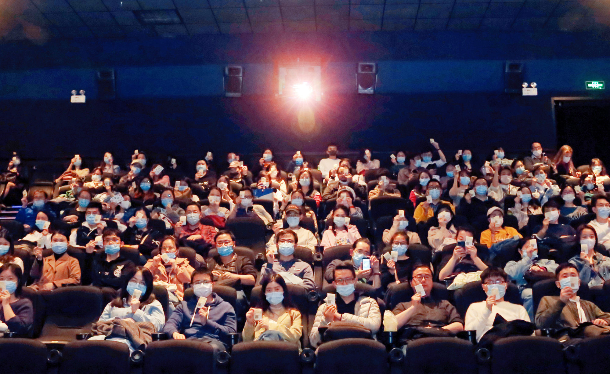 Residents watch a movie at a cinema in Shanghai, China, on April 5, 2021. Photo: Costfoto/Barcroft Media via Getty Images