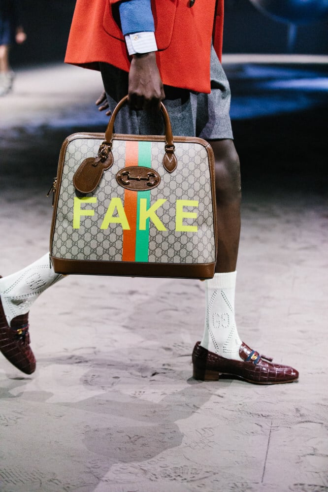 Brazen vendors selling knockoff Gucci and Louis Vuitton bags are