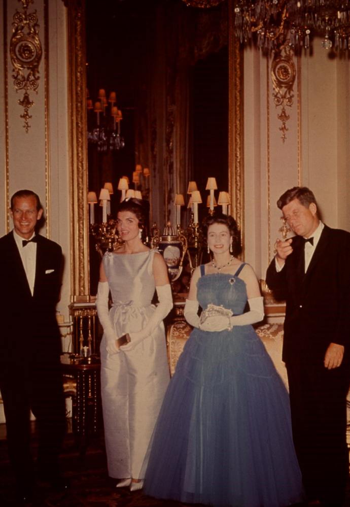 Prince Philip, Jacqueline Kennedy, Queen Elizabeth and then-president John F. Kennedy pose for photographers after dinner at Buckingham Palace on June 5, 1961. Photo: Bettmann-UPI