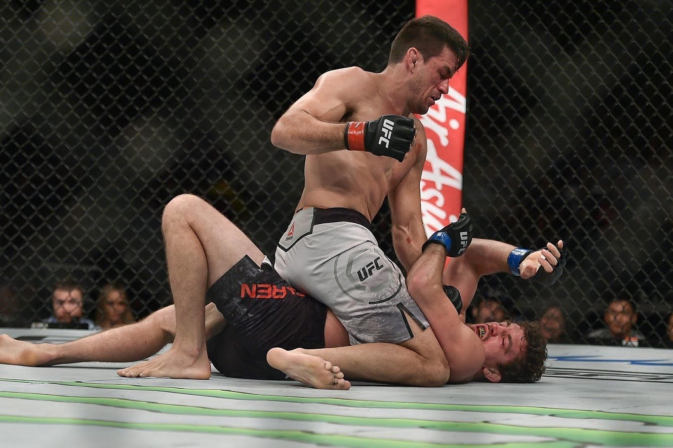 Demian Maia punches Ben Askren from the top. Photo: SingaporeMaven
