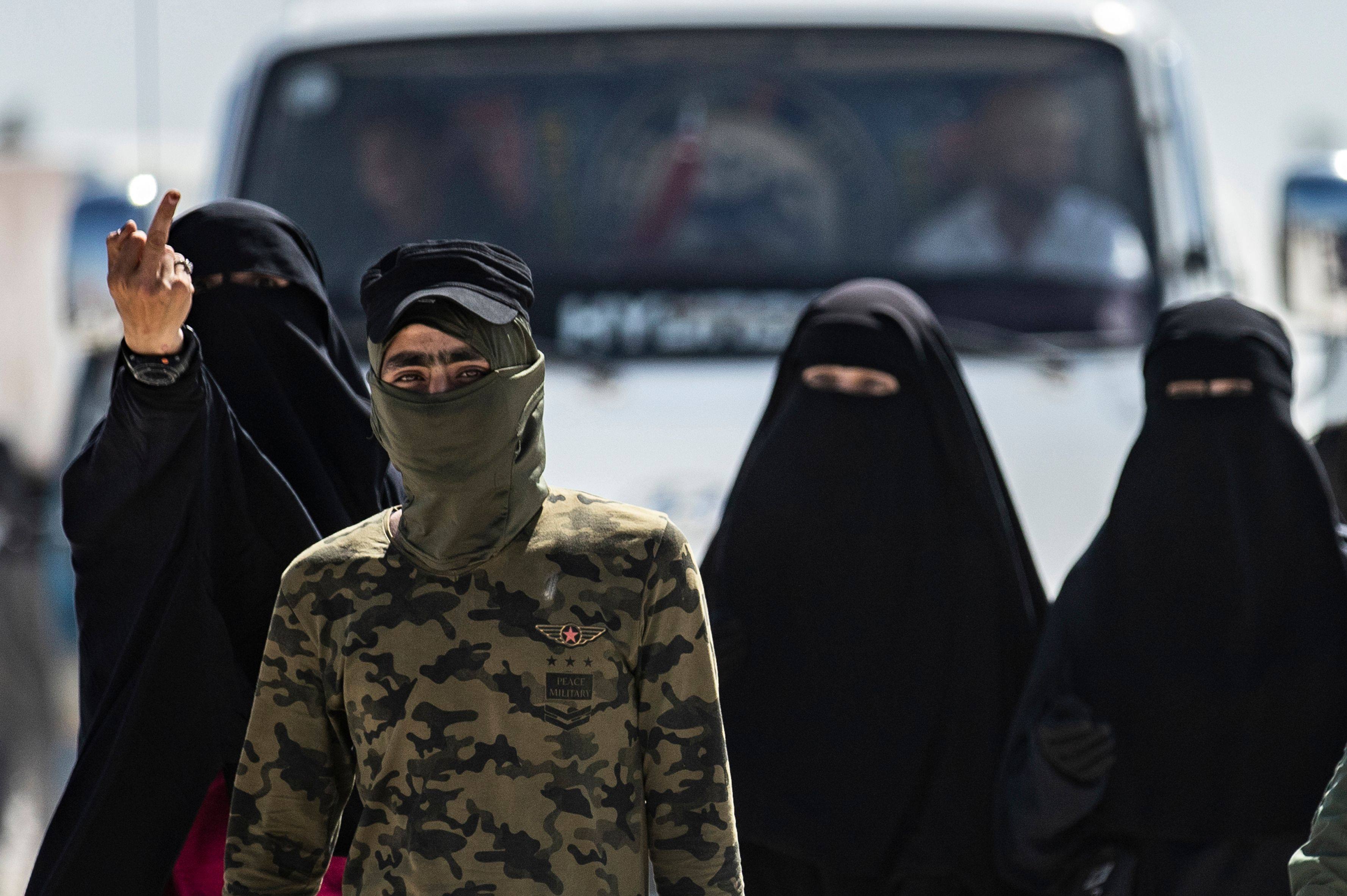 Women, reportedly wives of Islamic State fighters, in the al-Hol camp in  northeastern Syria. Photo: AFP