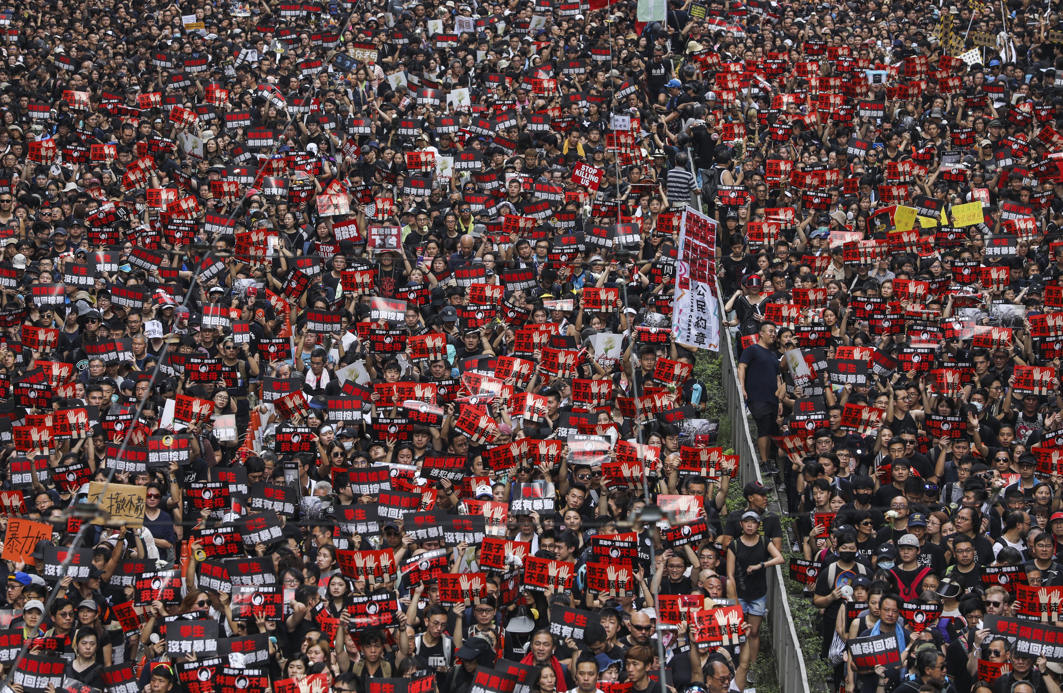 Protesters flood Causeway Bay during a massive march on June 16, 2019 against the government’s handling of a proposal to amend the extradition laws. Sam Tsang