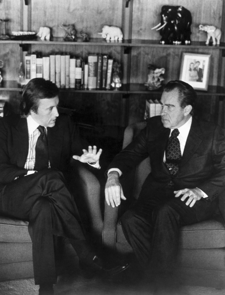 Veteran British broadcaster David Frost talks with former president Richard Nixon before the taping of their famous March 1977 interview. Photo: AP Photo