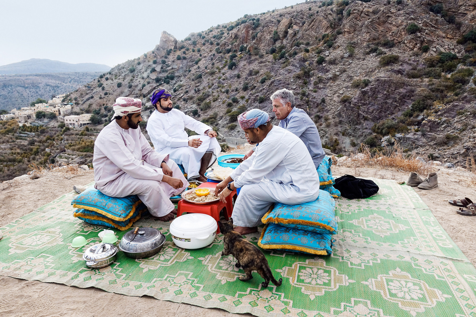 Bourdain enjoys a meal in Oman during season five of Parts Unknown. Photo: CNN