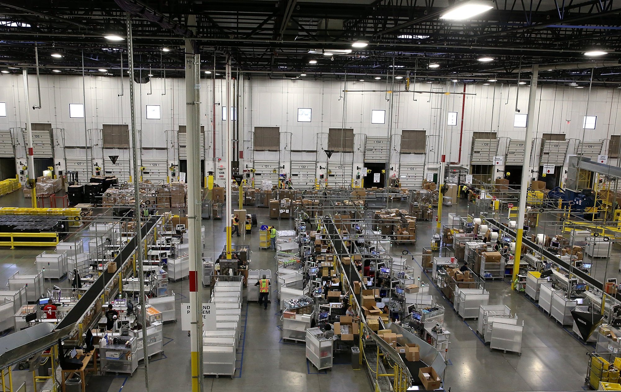 Like Amazon (above), Coupang has used a “unit-per-hour”, or UPH, metric to measure worker productivity in real time. Photo: Getty Images