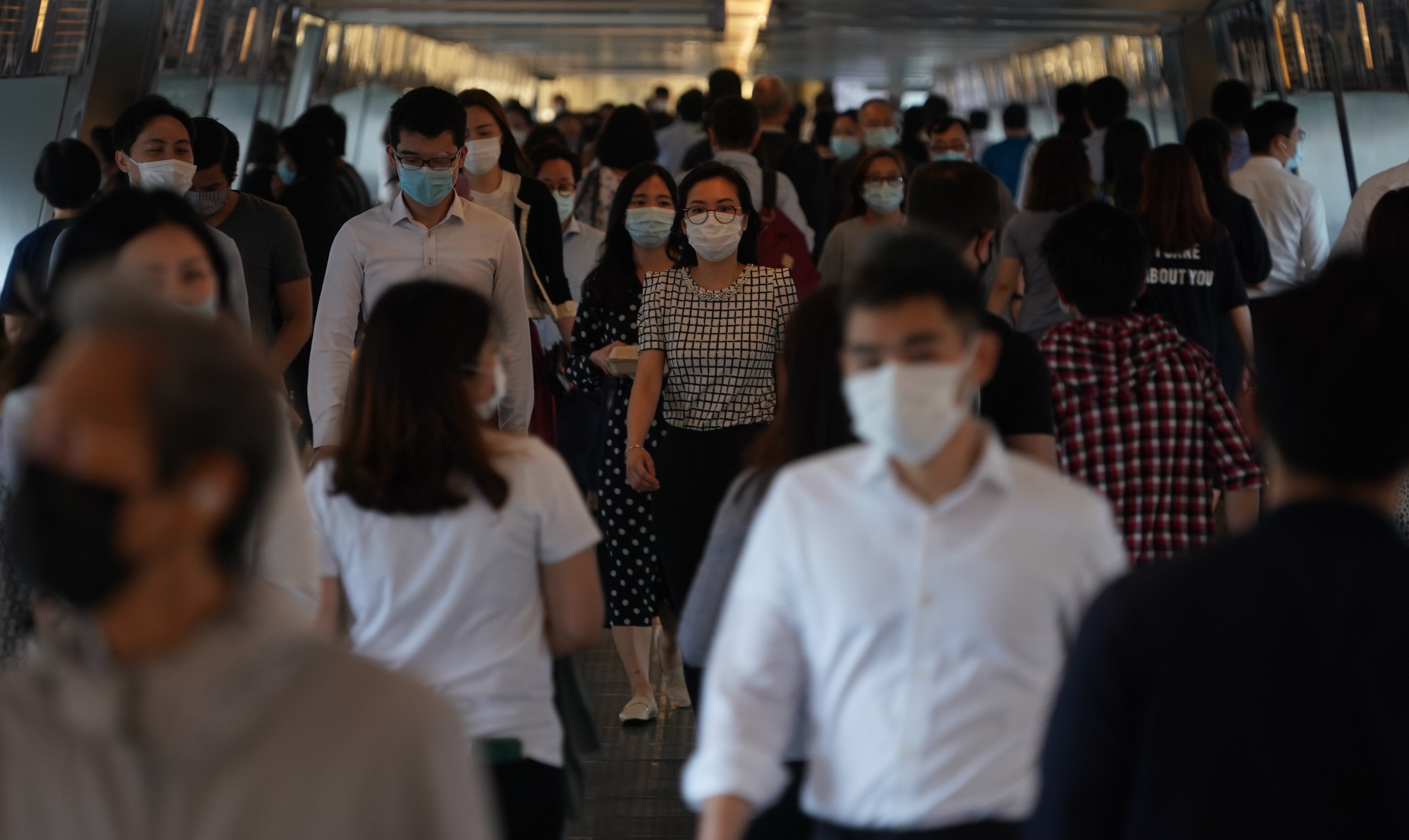 The coronavirus pandemic has compelled social distancing, giving a bolster to digital banking services. A  view of labour force in Central on May 3, 2021. Photo: Felix Wong