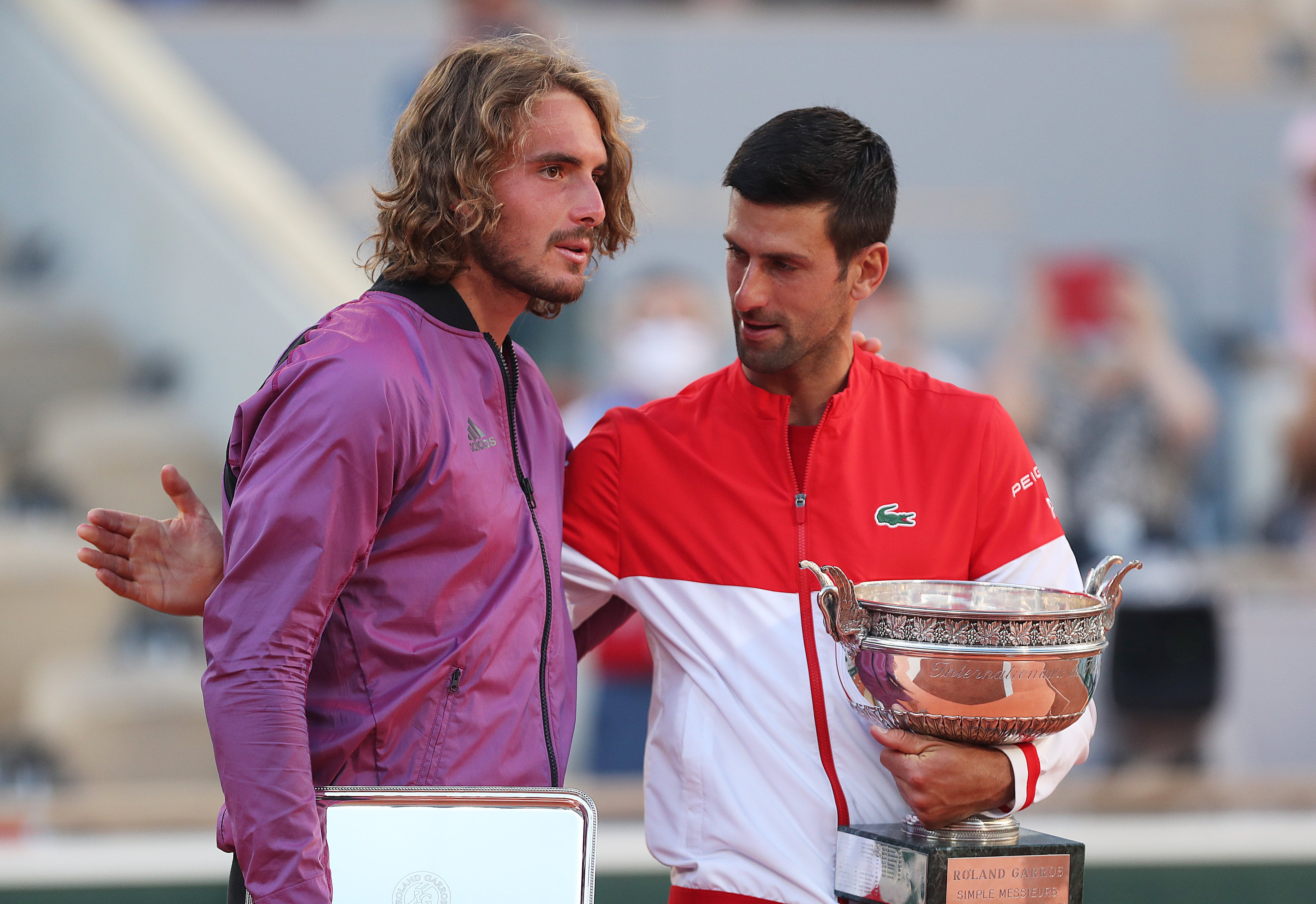 Sefanos Tsitsipas, of Greece, and Novak Djokovic, of Serbia, after the men’s singles final at the 2021 French Open. Photo: Xinhua