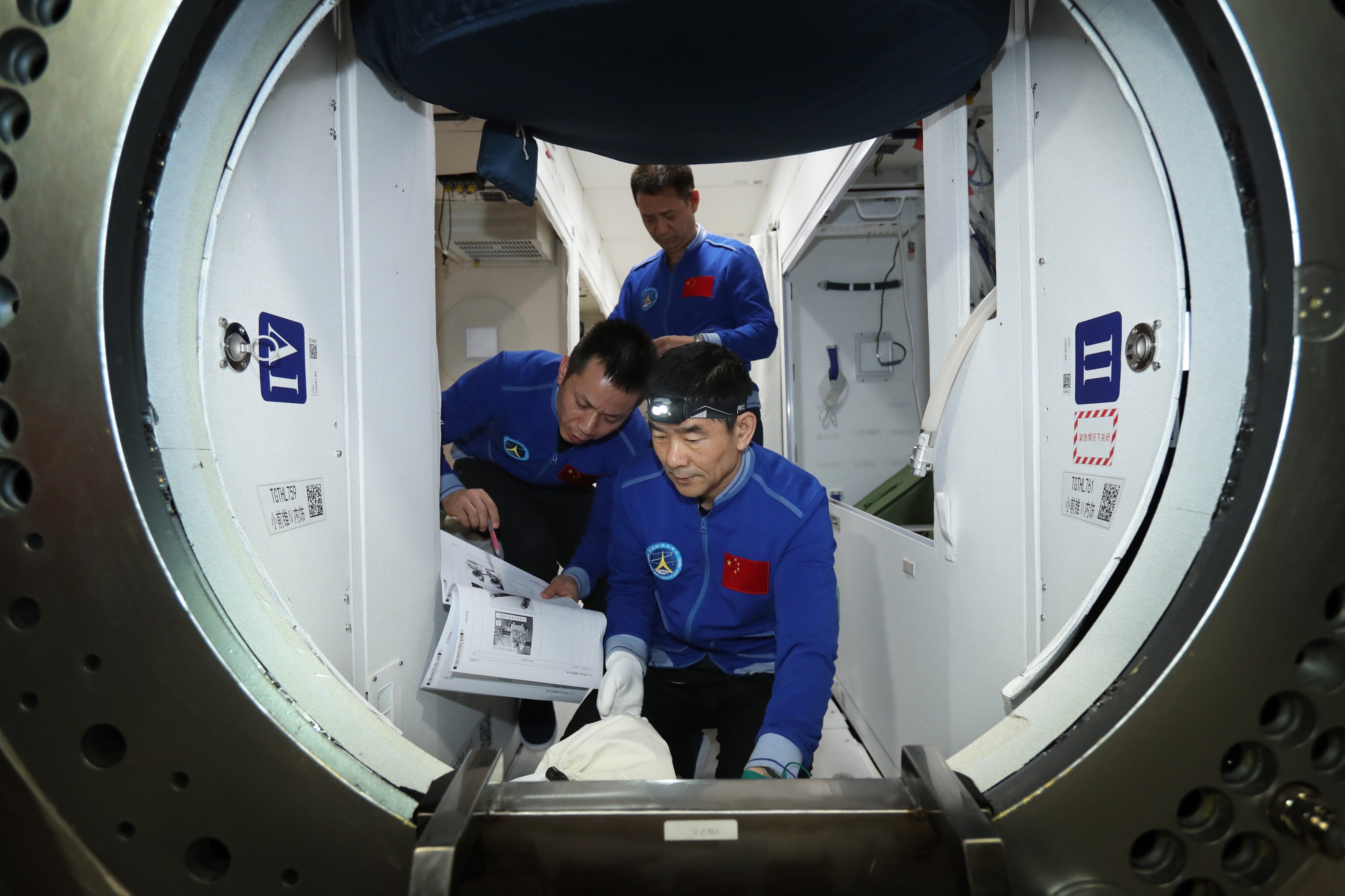 China’s three-man crew during training before the launch of the Shenzhou-12 space mission. Photo: Xinhua