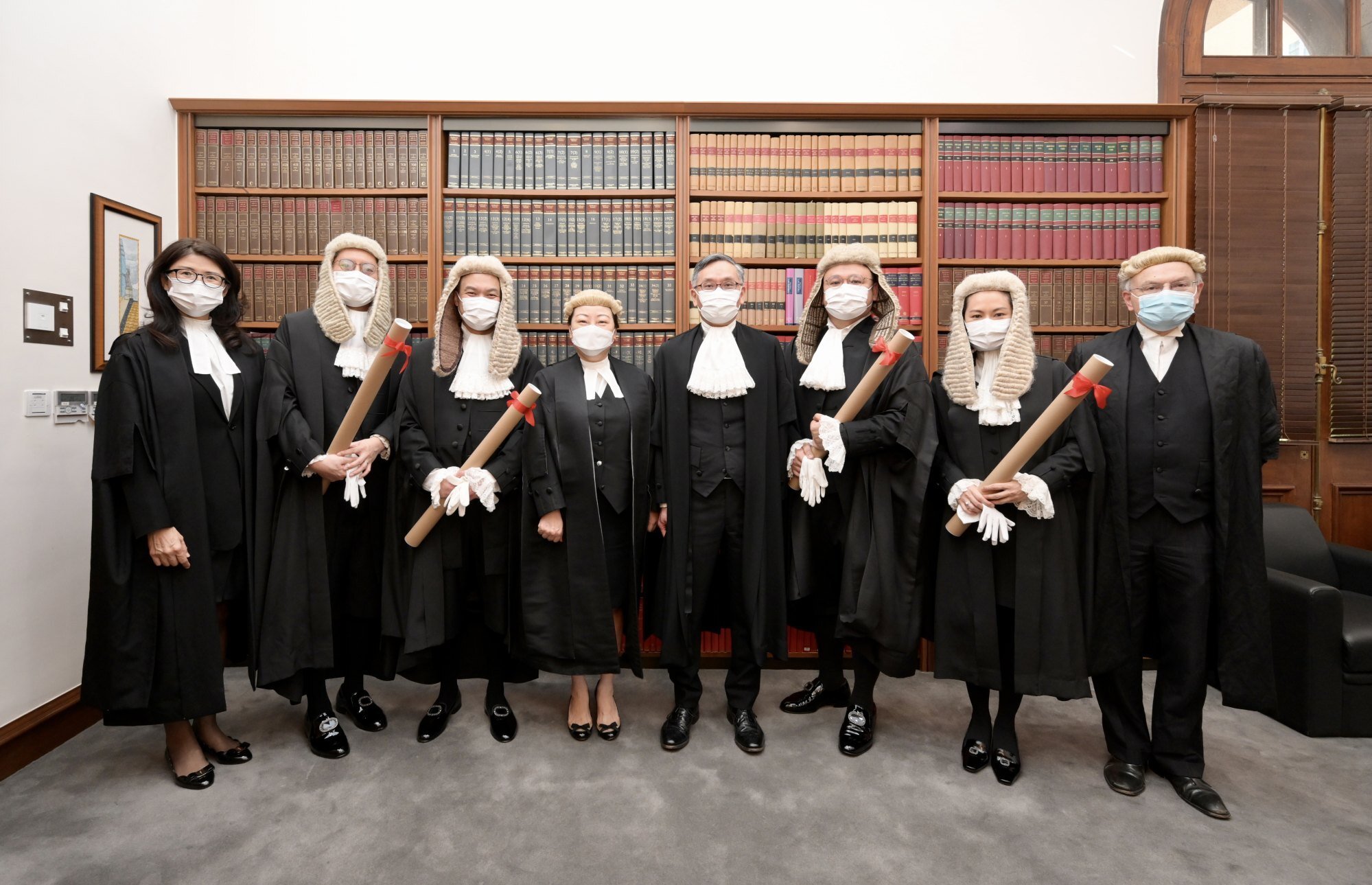 The ceremonial proceedings for the admission of the newly appointed Senior Counsel took place at the Court of Final Appeal today (May 29). Photo shows the Chief Justice of the Court of Final Appeal, Mr Andrew Cheung Kui-nung (fourth right); the Secretary for Justice, Ms Teresa Cheng, SC (fourth left); the Chairman of the Hong Kong Bar Association, Mr Paul Harris, SC (first right); and the President of the Law Society of Hong Kong, Ms Melissa Pang (first left), with the newly appointed Senior Counsel Mr Philip Chau Ka-chun (third left), Mr Law Man-chung (third right), Mr Norman Nip Sum-ping (second left) and Ms Vinci Lam Wing-sai (second right).