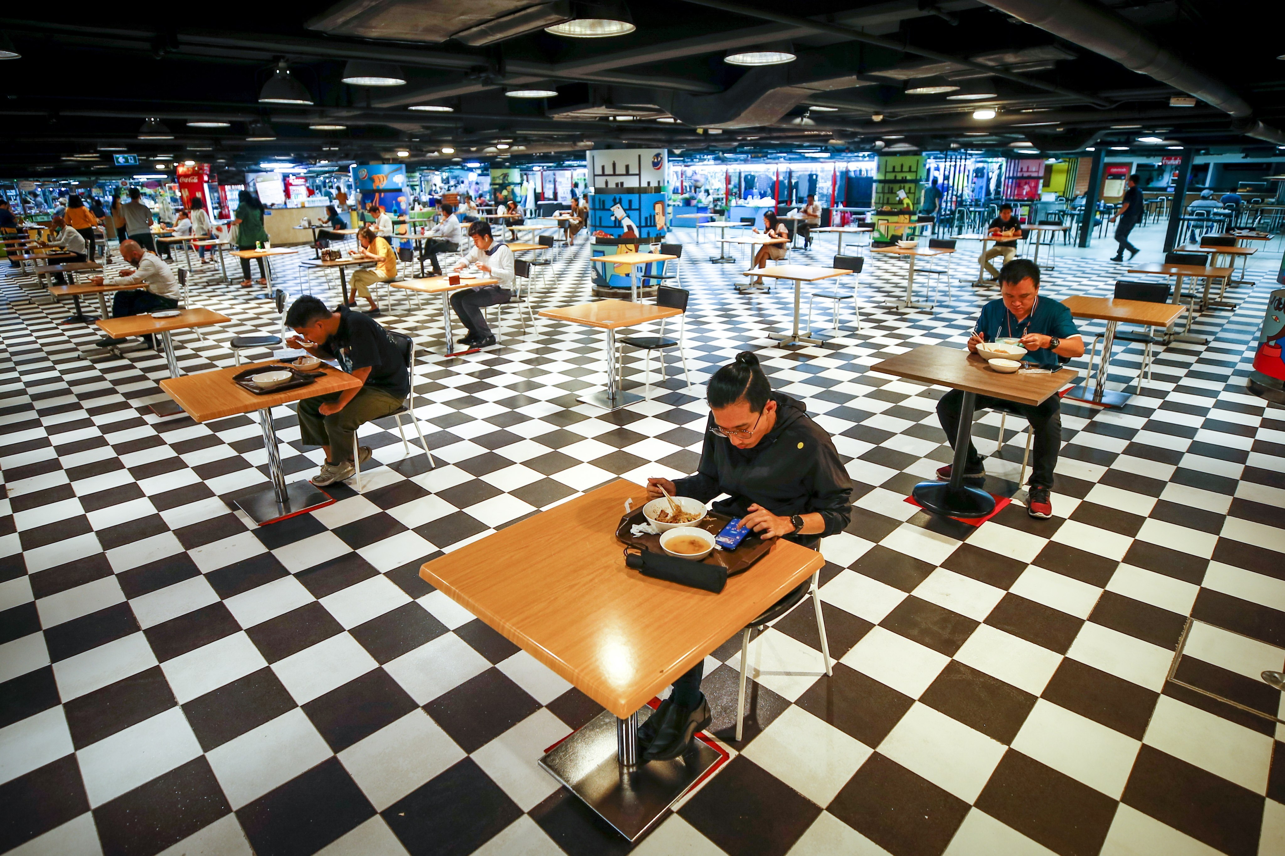 A food court in Bangkok, Thailand, operating at 25 per cent capacity. Photo: EPA