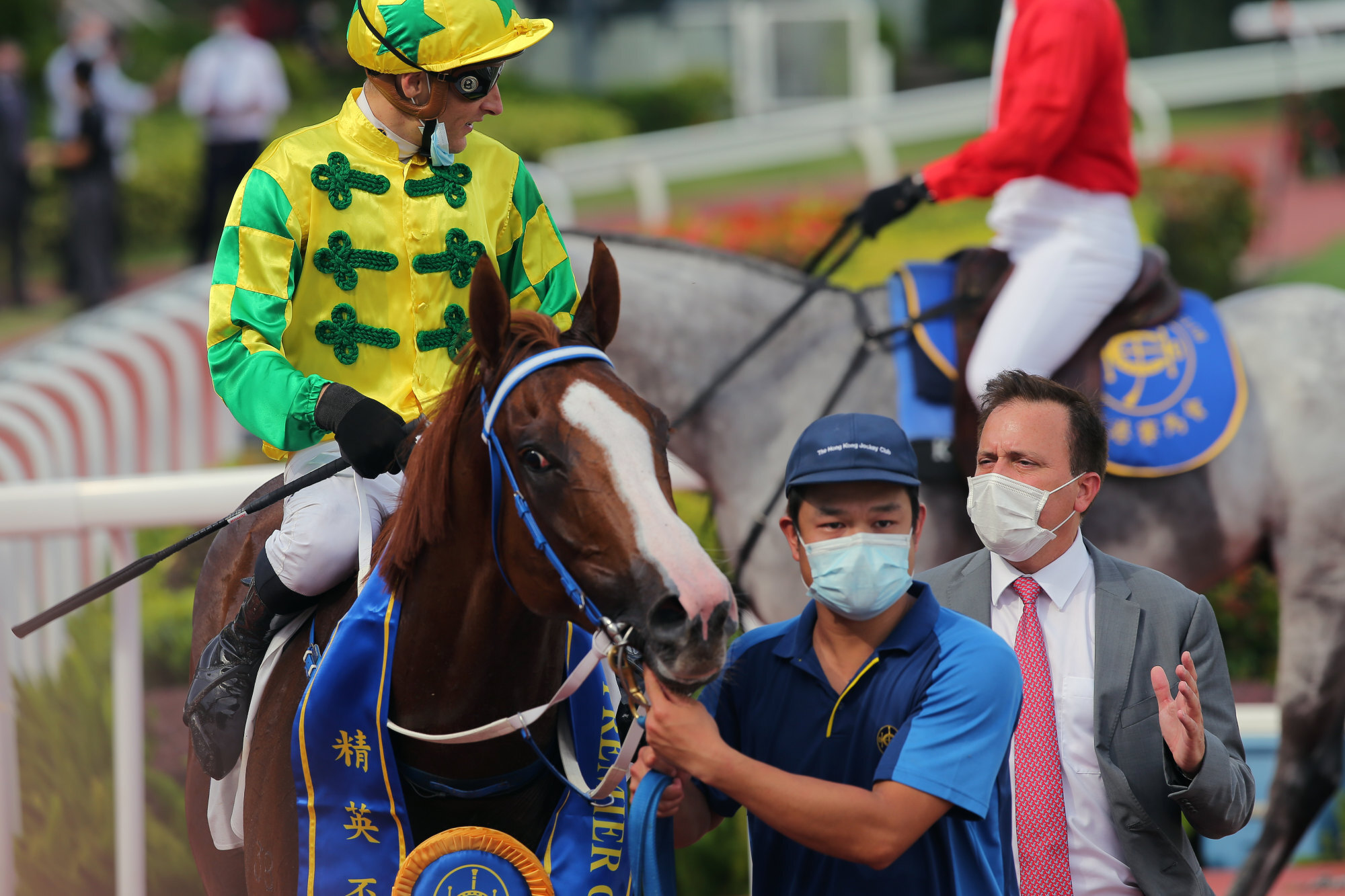 Jockey Blake Shinn talks to trainer Caspar Fownes after Sky Field’s victory.