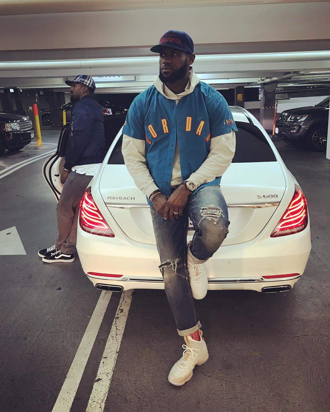 Lebron James and one of his many luxury cars. Photo: @kingjames/Instagram