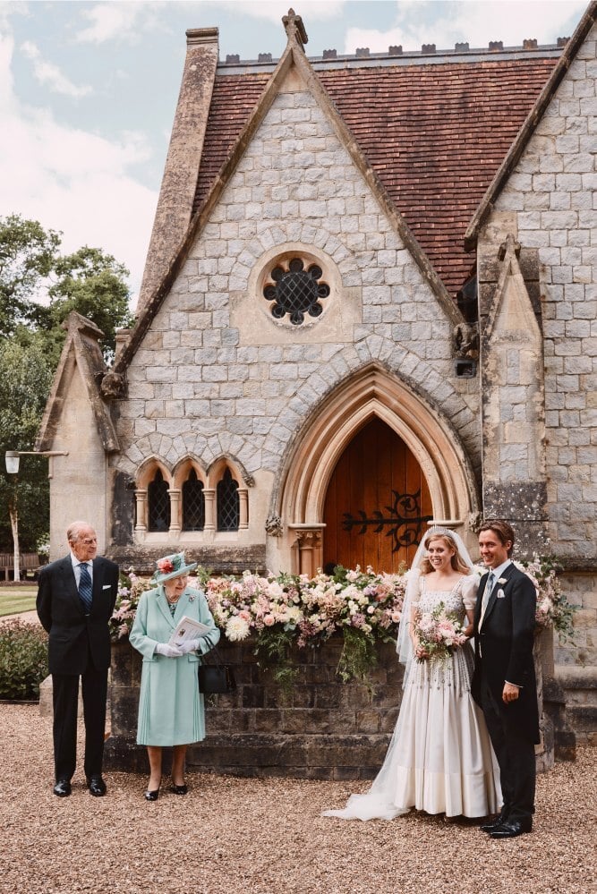 Britain’s Queen Elizabeth and Prince Philip, the Duke of Edinburgh, standing with Princess Beatrice and real estate developer Edoardo Mapelli Mozzi outside the Royal Chapel of All Saints in Windsor, in July 2020. Photo: Handout