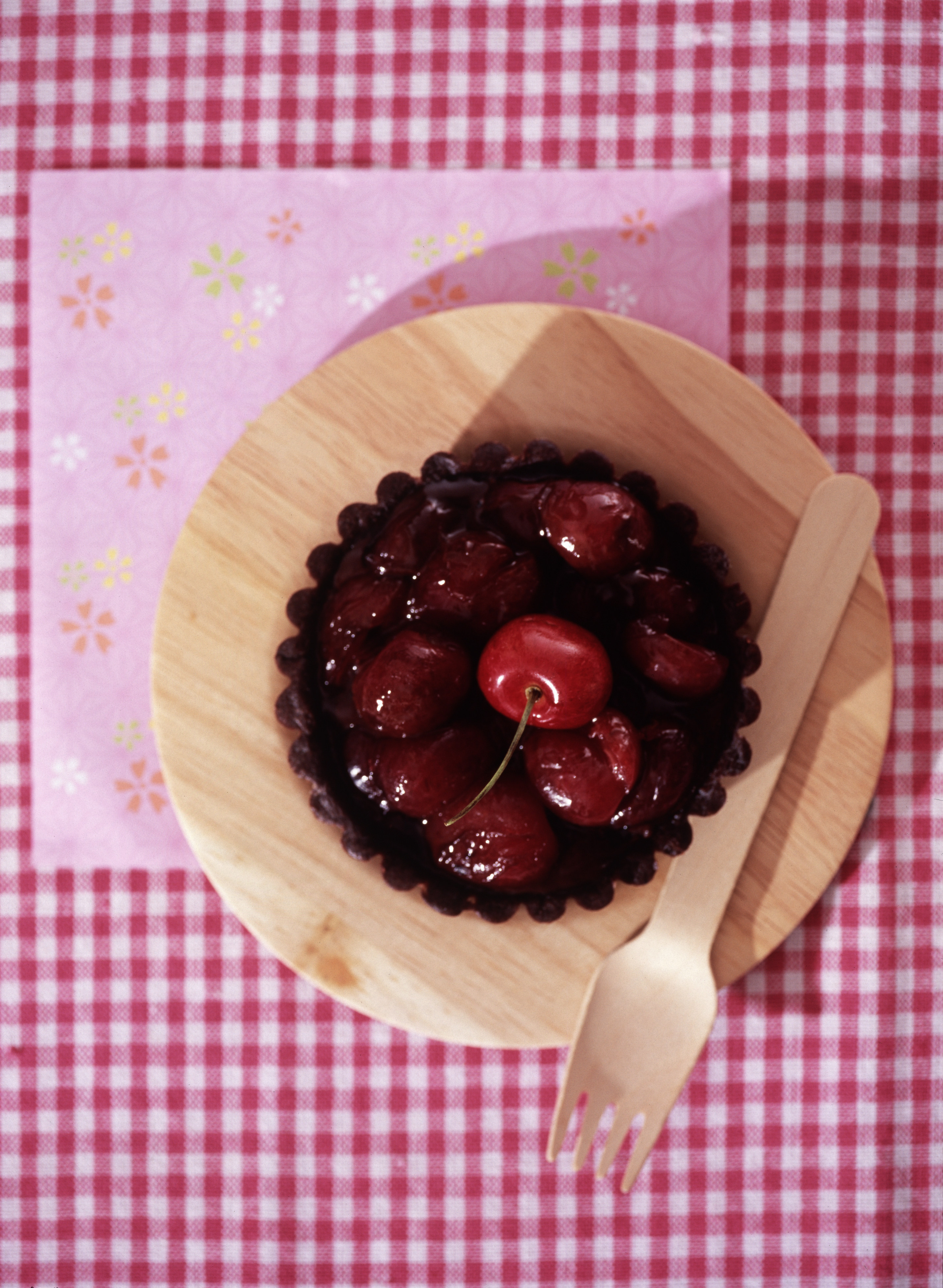 This double-chocolate cherry tart is rich and decadent, and best served warm from the oven. Photo: Koji Studio