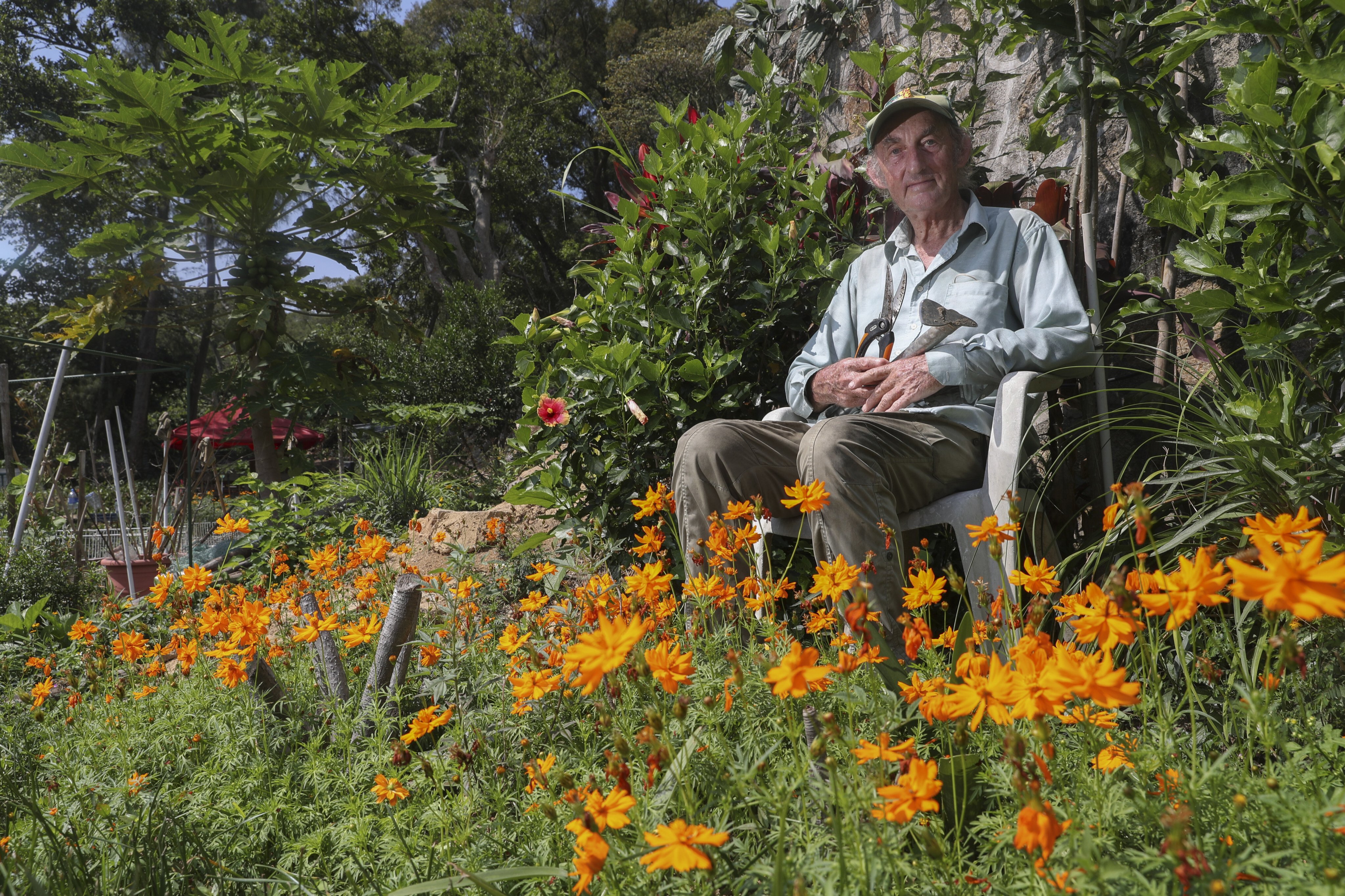 After a lifetime of travel and teaching, Geoff Smith has retired to Lamma Island in Hong Kong where he grows flowers. Photo: Edmond So