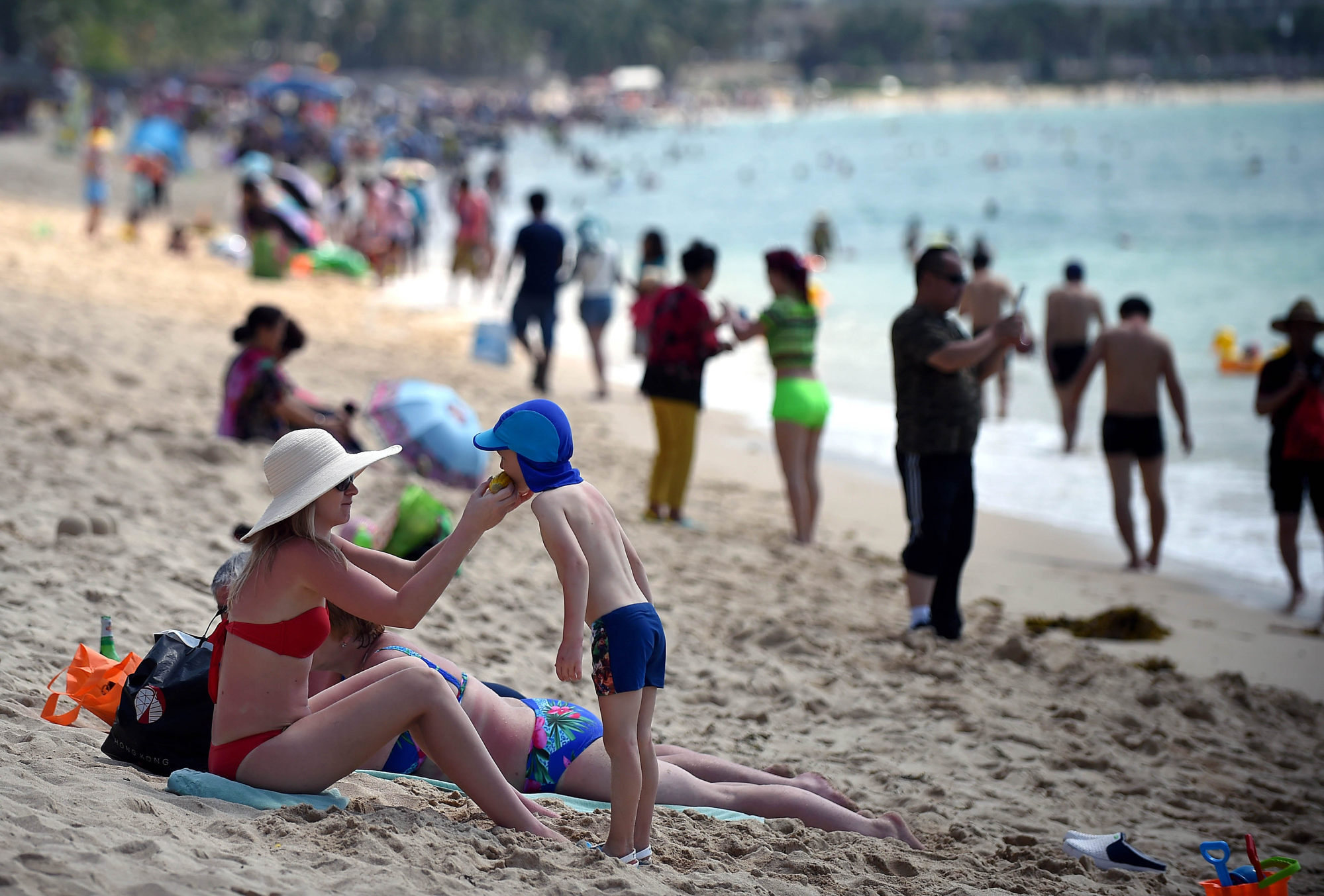 Chinese Tourist on the Beach