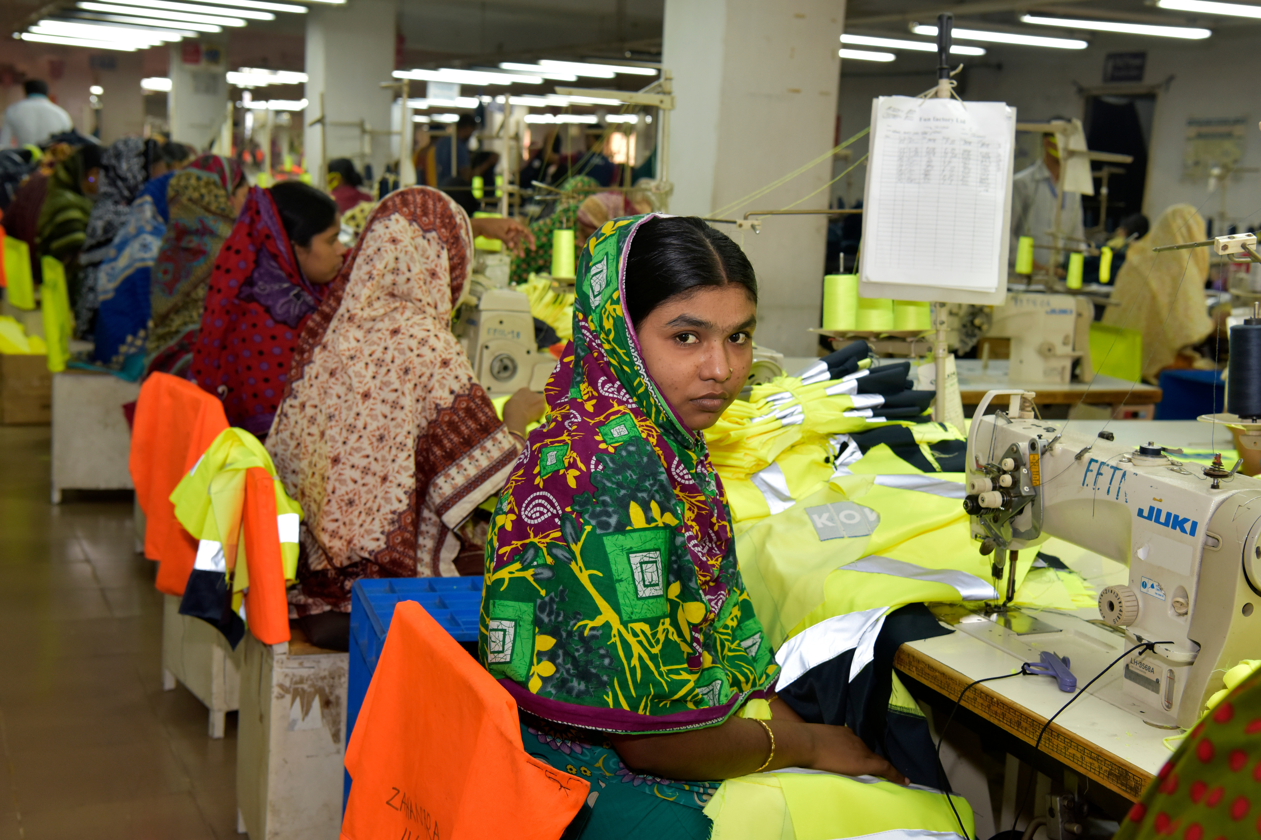 Most fashion labels are failing on gender equality. Bangladeshi garment workers inside a factory in Dhaka, Bangladesh. Photo: Shutterstock