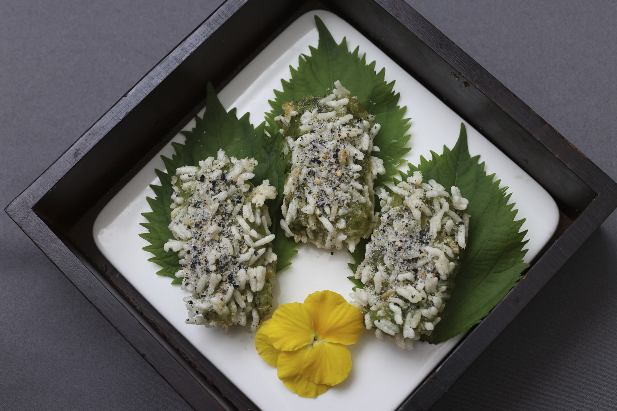 Sweet crispy glutinous rice cake with green vegetables. Photo: K.Y. Cheng