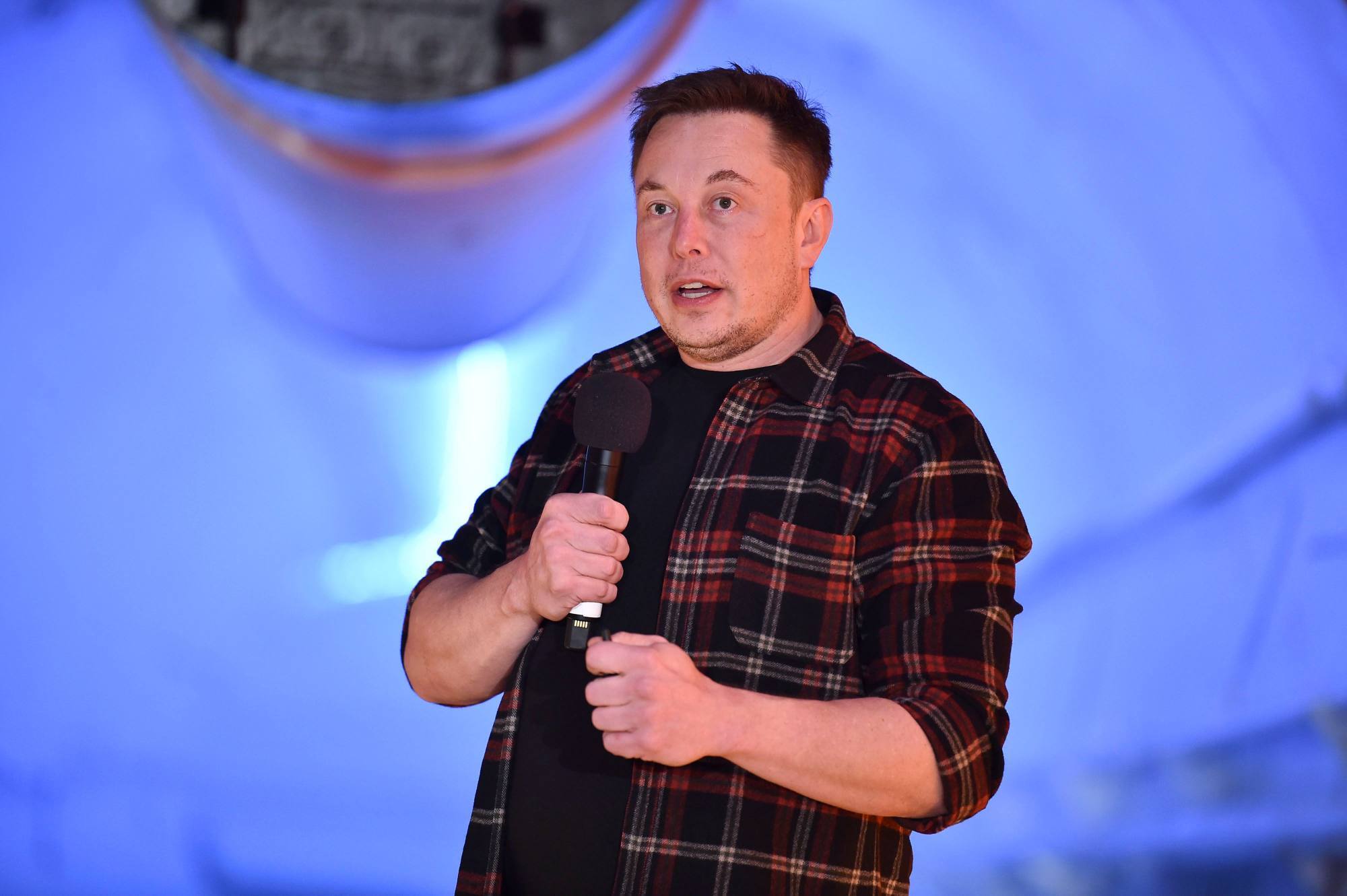 Elon Musk, co-founder and chief executive officer of Tesla, speaks during an unveiling event for The Boring Company’s Hawthorne test tunnel, south of Los Angeles, California, in December 2018. Photo: AFP