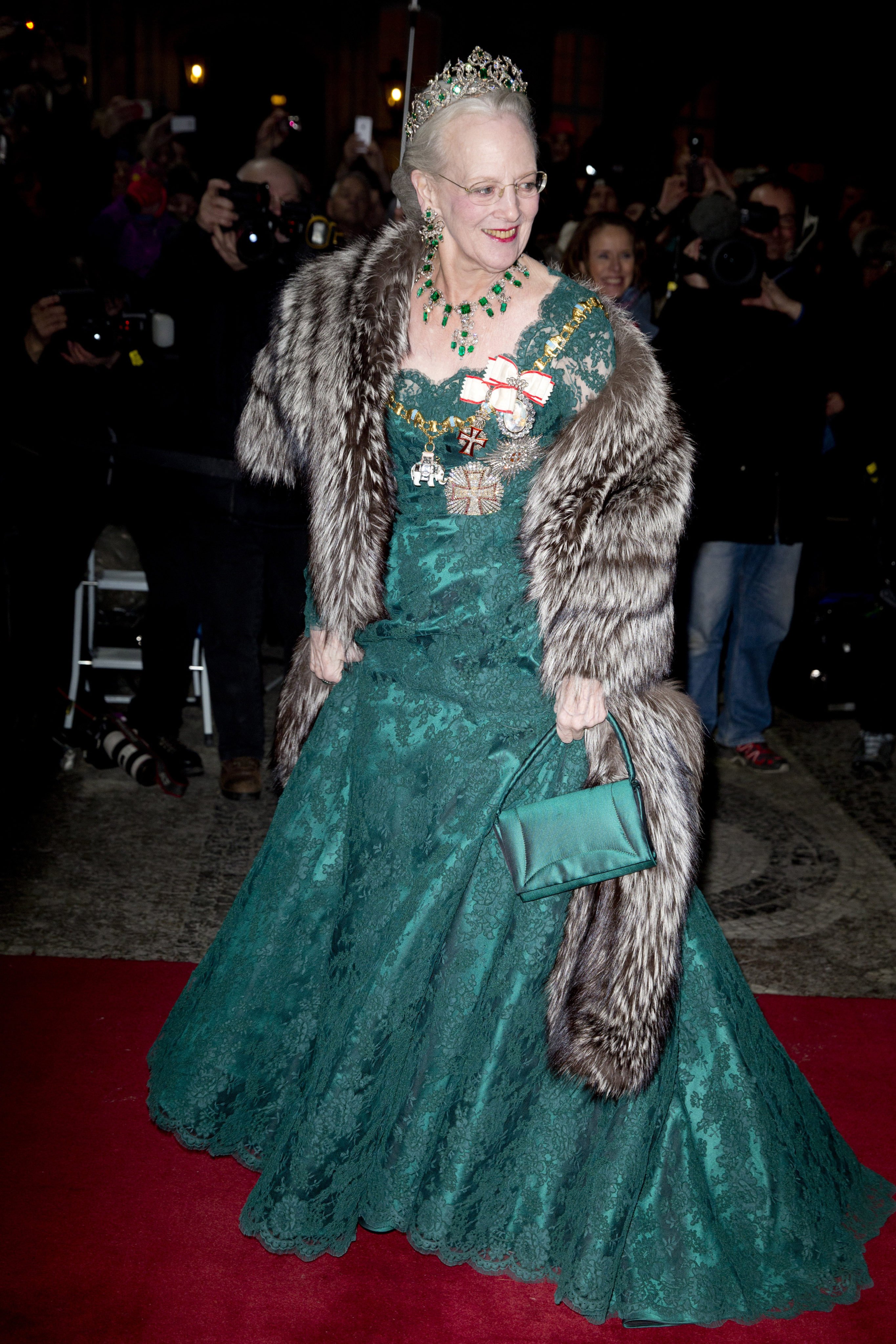 Queen Margrethe of Denmark knows how to make an entrance, matching her dresses to pieces from one of the world’s most stunning royal jewellery collections. Photo: Getty Images