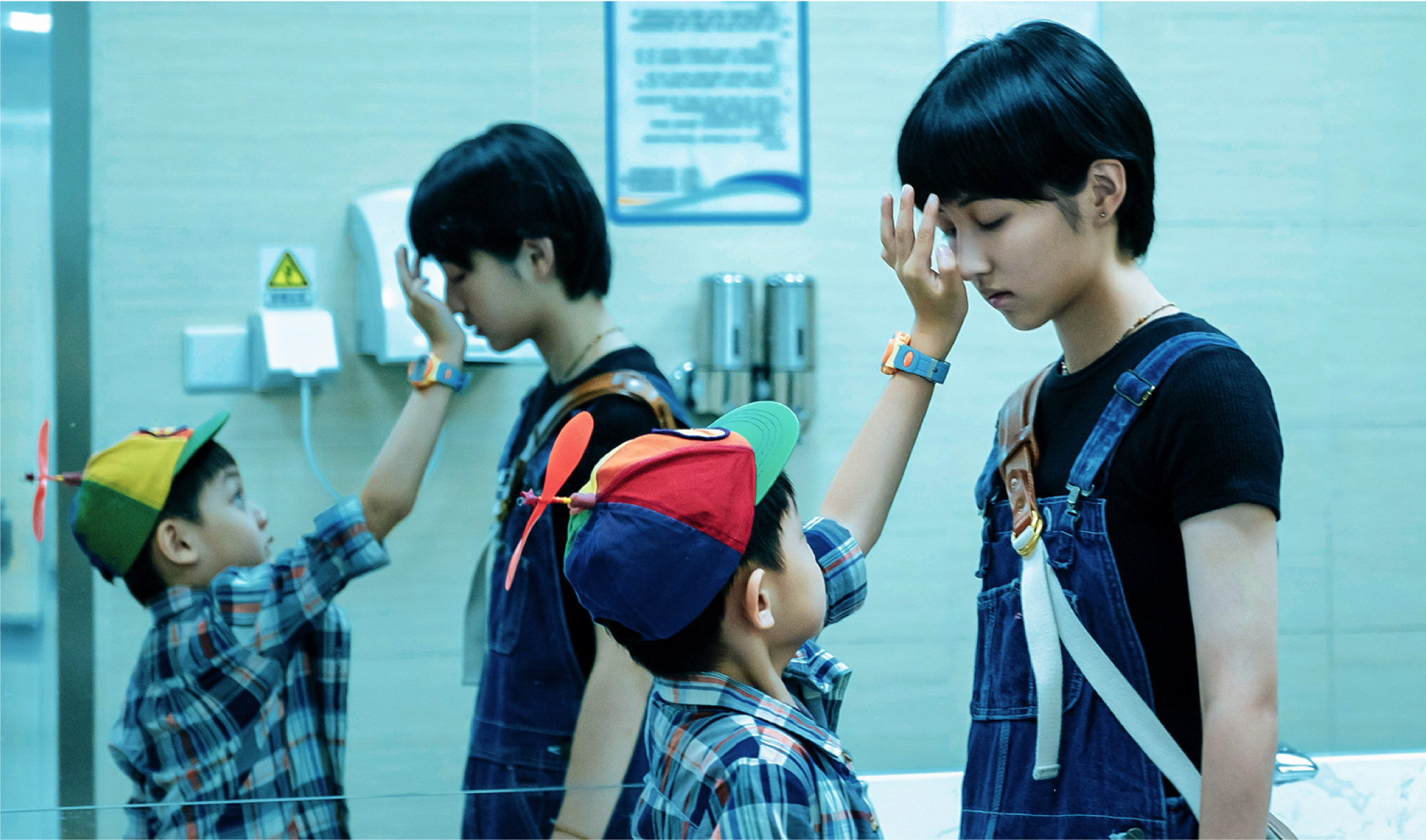 Zhang Zifeng (right) and Jin Yaoyuan in a still from Sister.