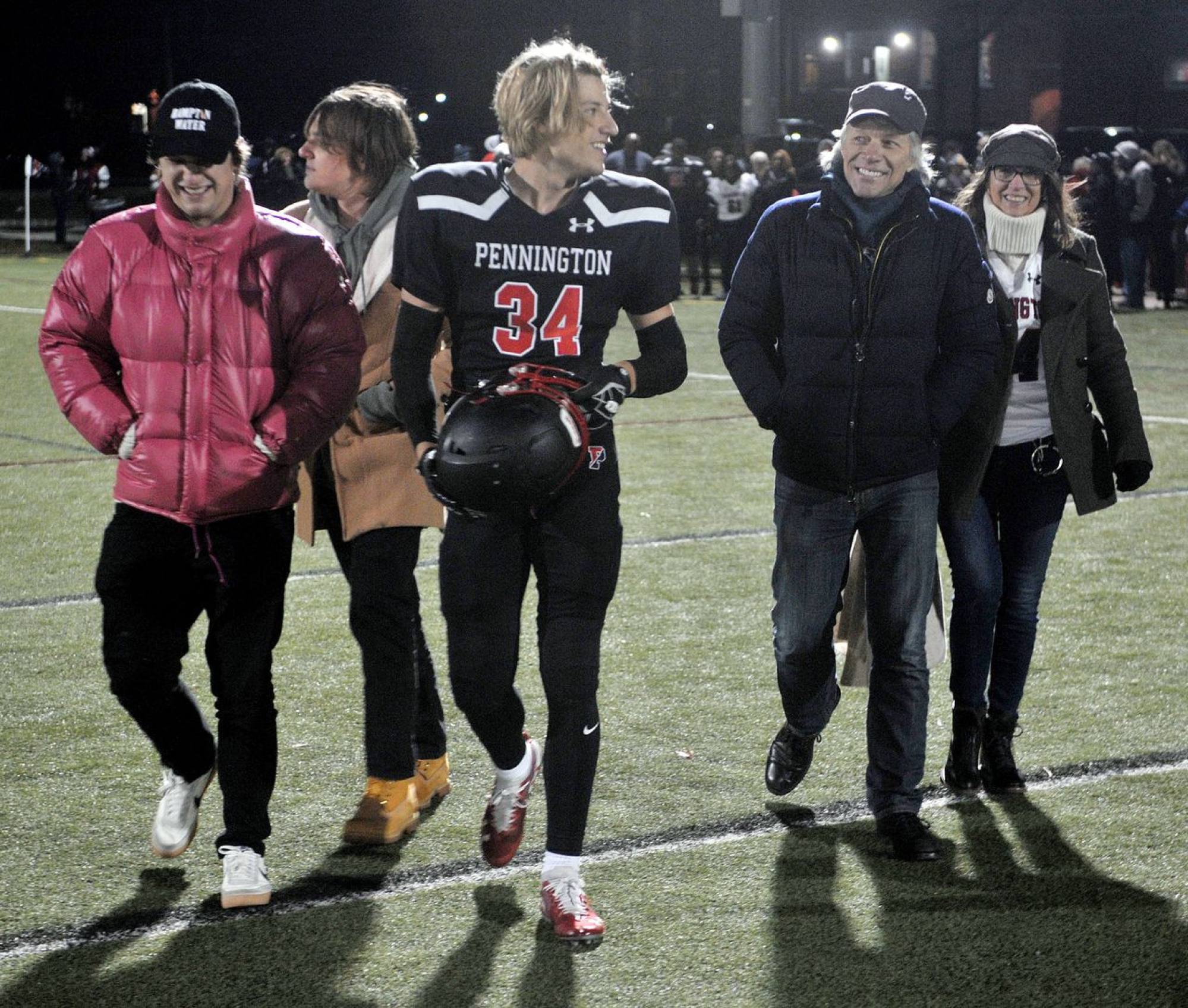 Rock 'n' roll on the gridiron: Jon Bon Jovi supports his son on the pitch. Photo: @njdotcom/Twitter