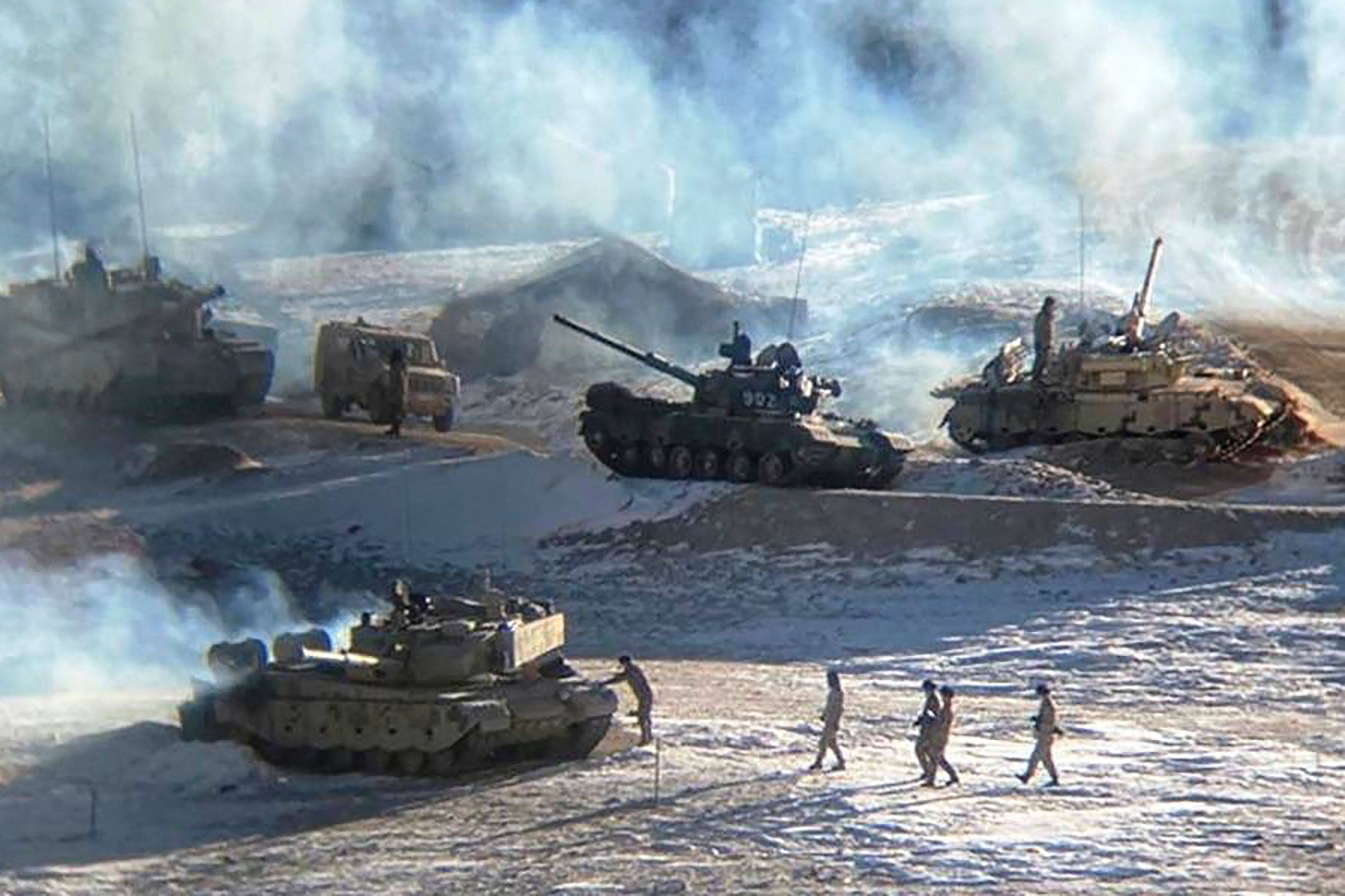 Chinese People Liberation Army soldiers and tanks along the Line of Actual Control at the India-China border in Ladakh. Photo: AFP